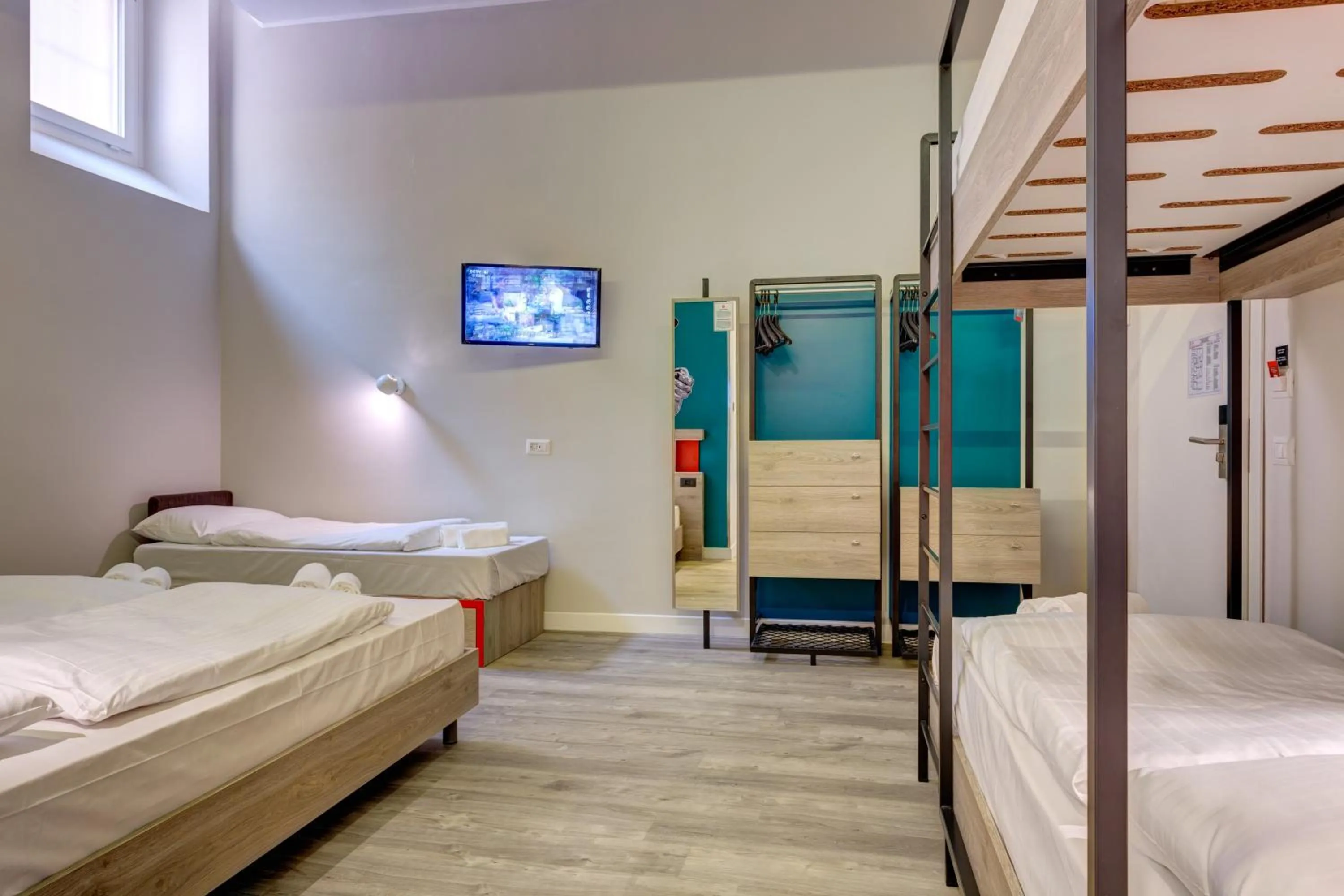 Photo of the whole room, Bed in MEININGER Roma Termini