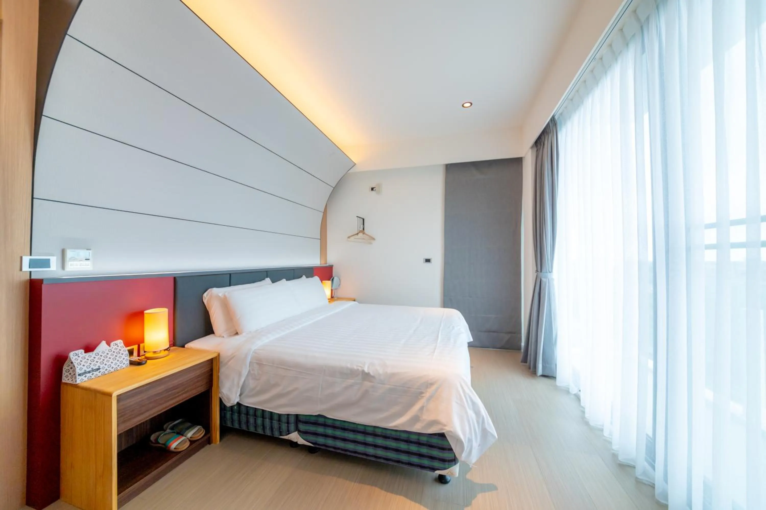 Bed in Sunshine Palm B&B