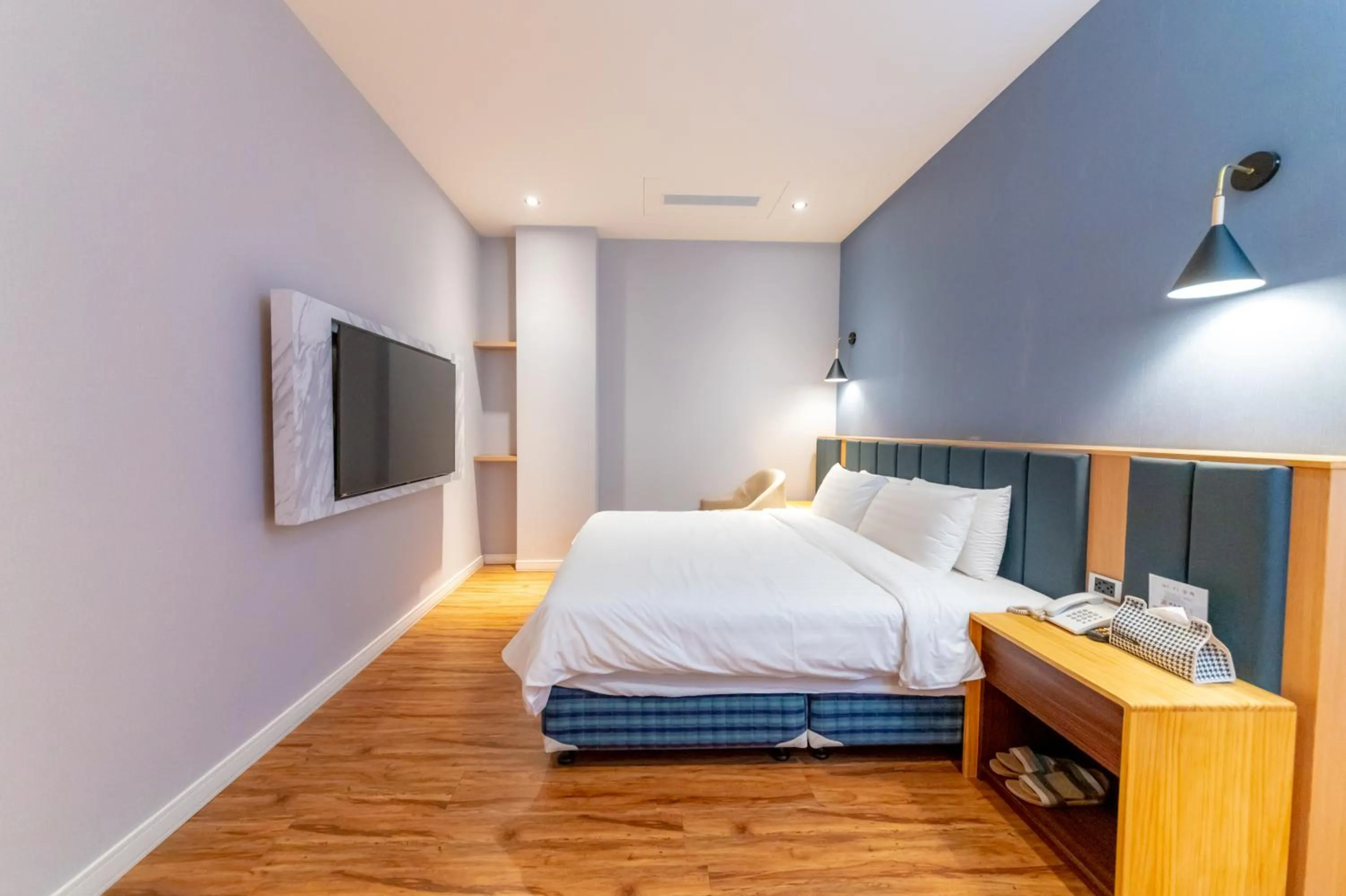 Bed in Sunshine Palm B&B