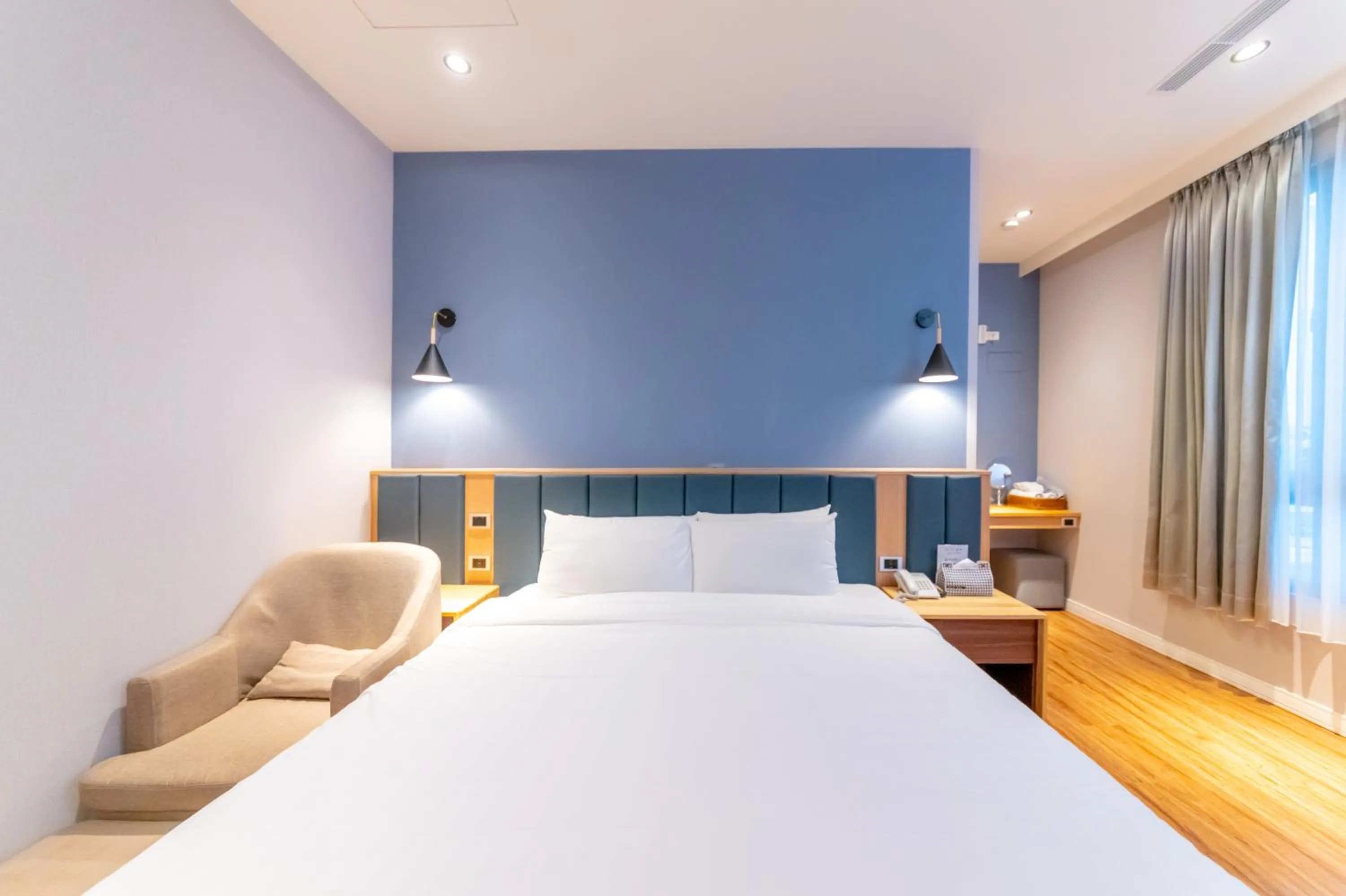 Bed in Sunshine Palm B&B