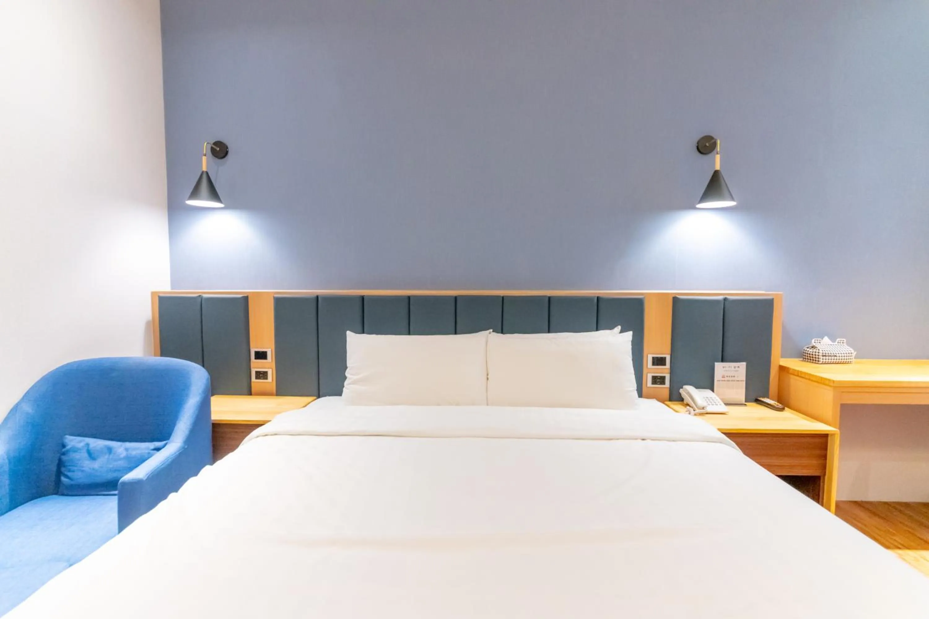 Bed in Sunshine Palm B&B