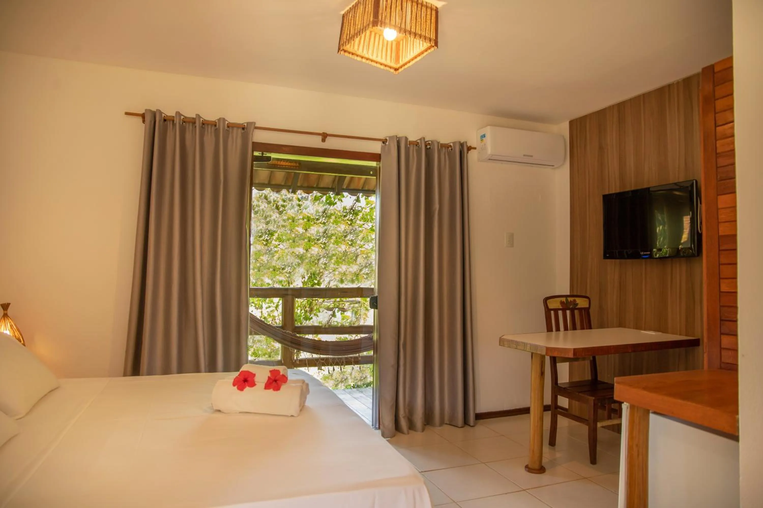 Photo of the whole room, Bed in Pousada Vila do Dengo