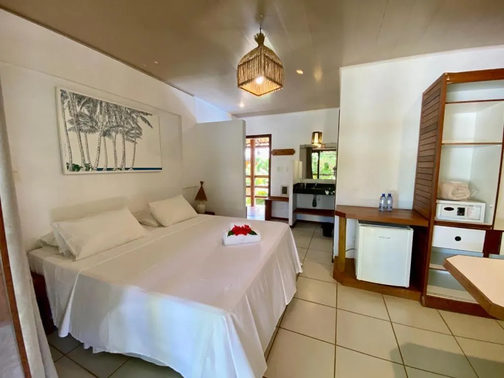 Bed in Pousada Vila do Dengo