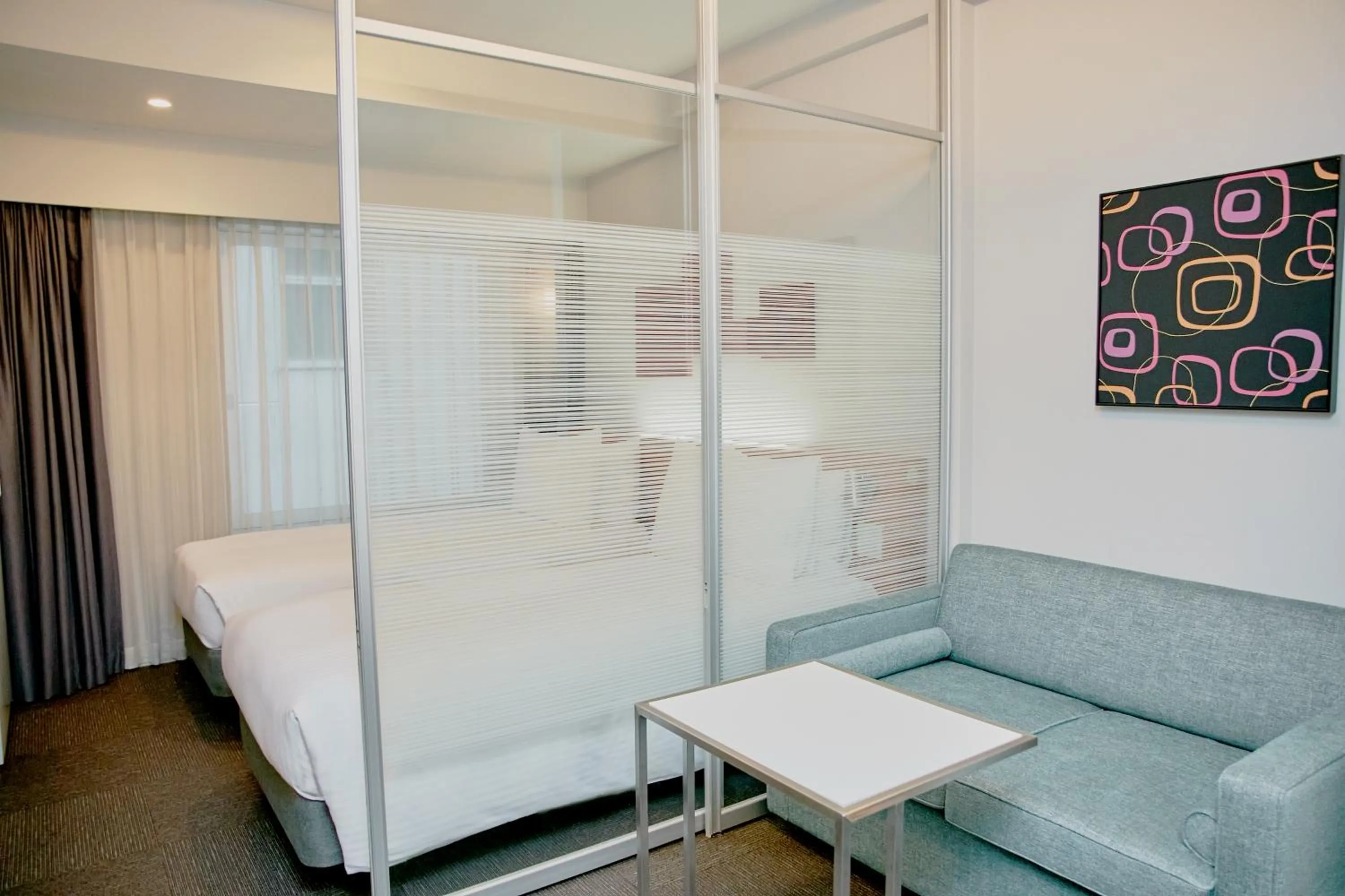 Living room, Bed in Citadines Shinjuku Tokyo