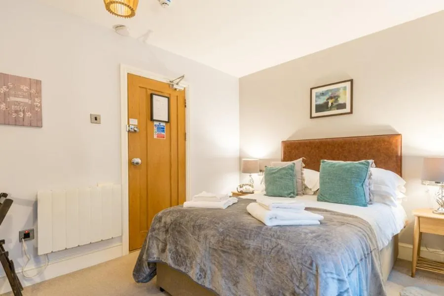 Bed in The Gower Hotel