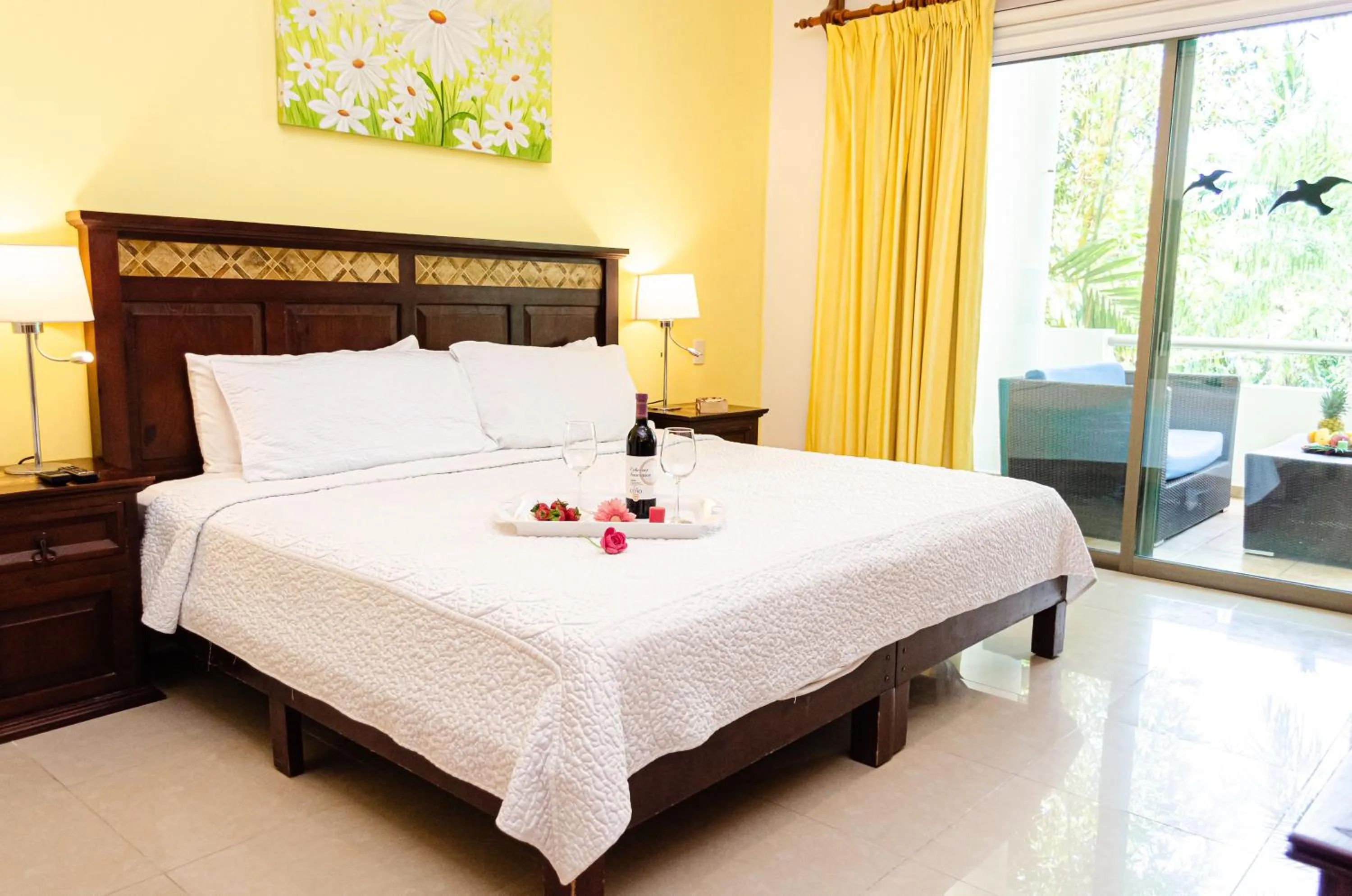 Bed in Riviera Maya Suites