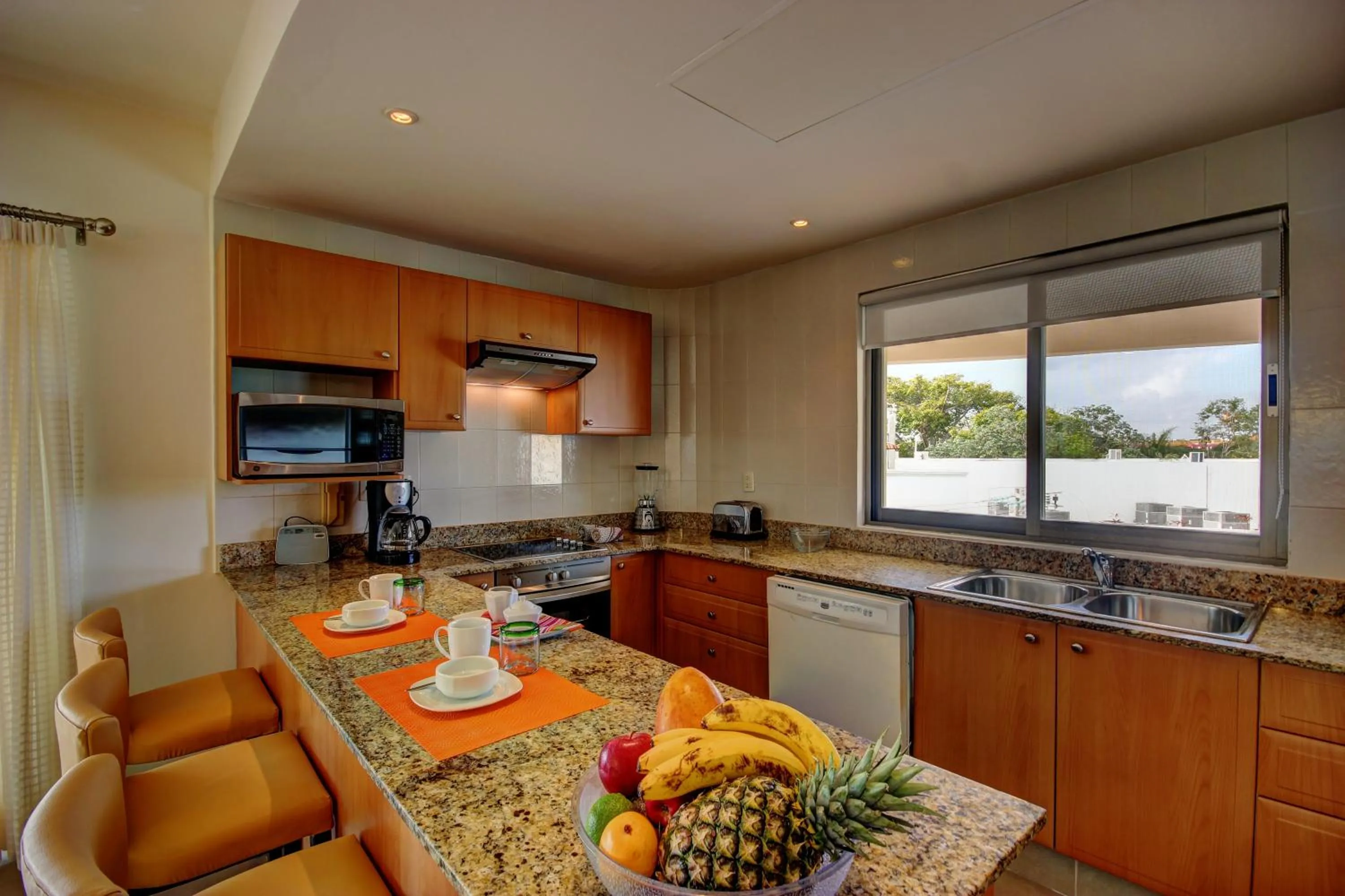 Kitchen or kitchenette in Riviera Maya Suites