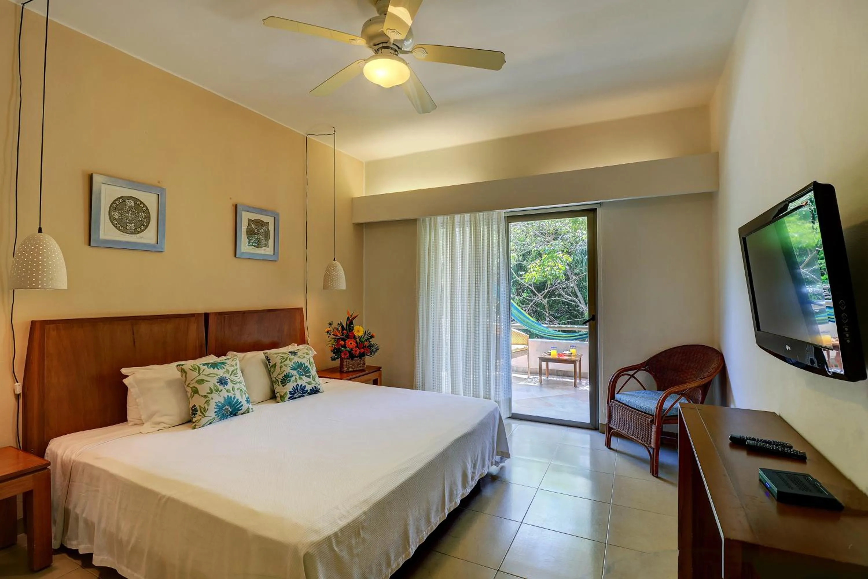 Bed in Riviera Maya Suites