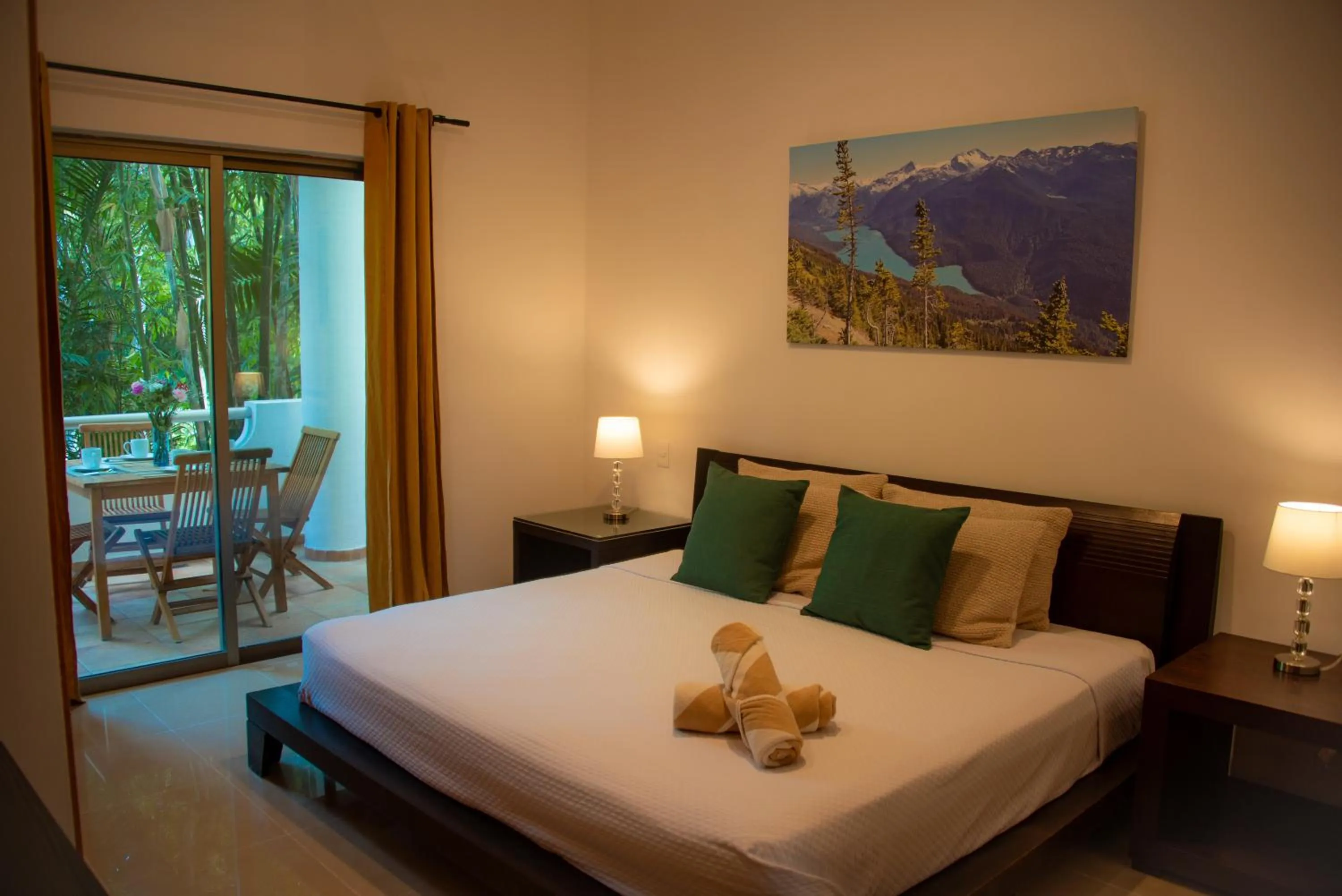 Bed in Riviera Maya Suites