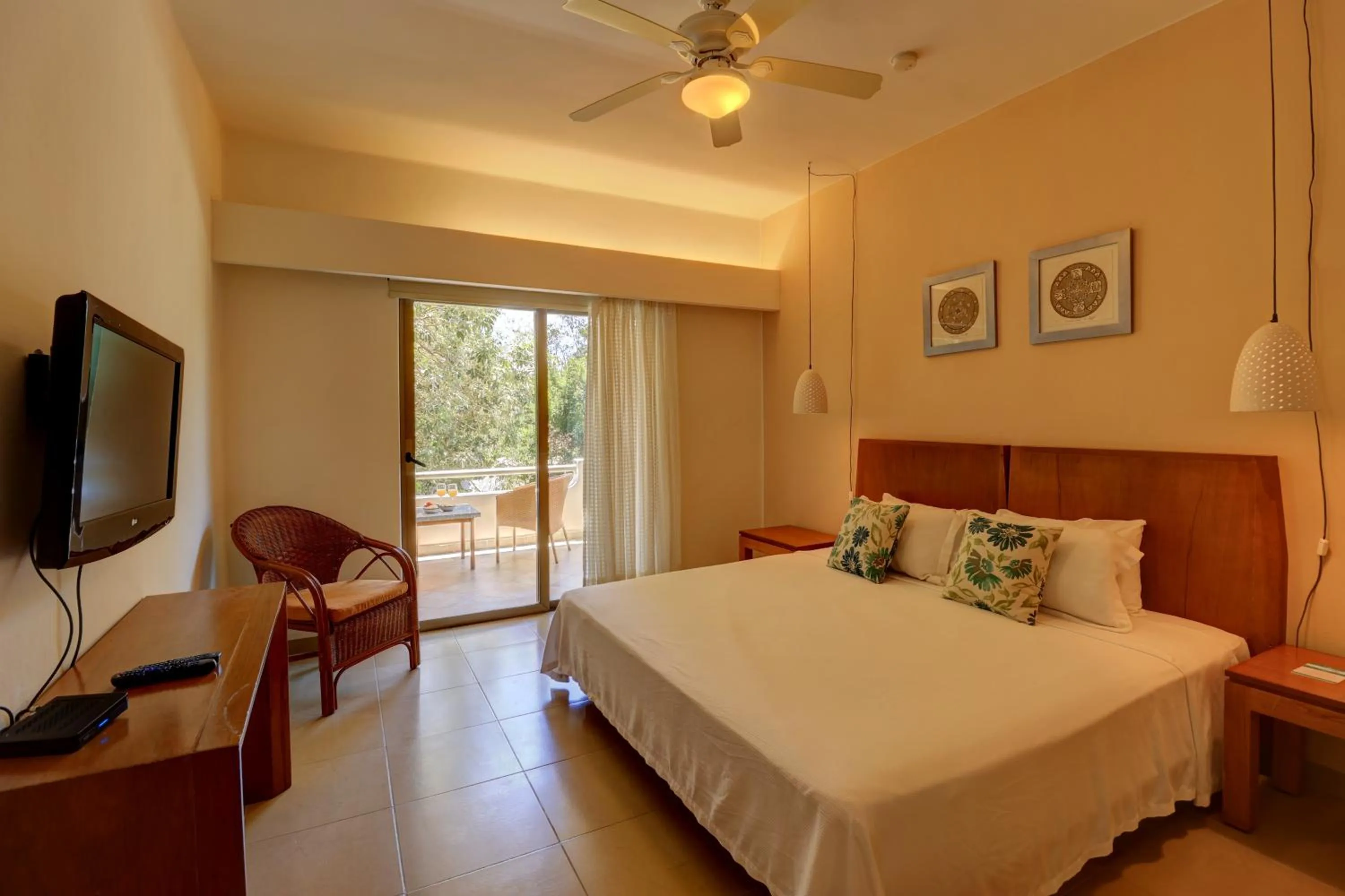 Bed in Riviera Maya Suites