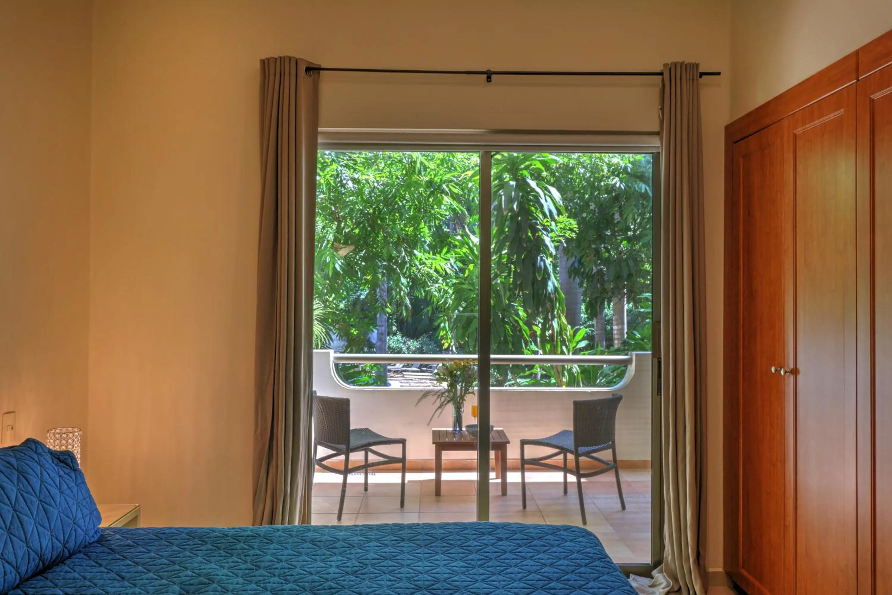 Bed in Riviera Maya Suites