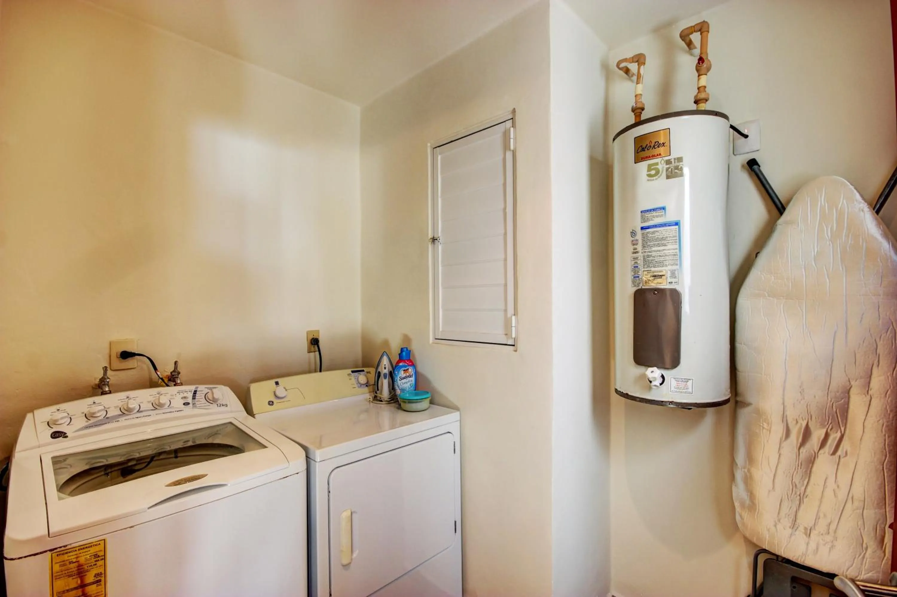 washing machine in Riviera Maya Suites