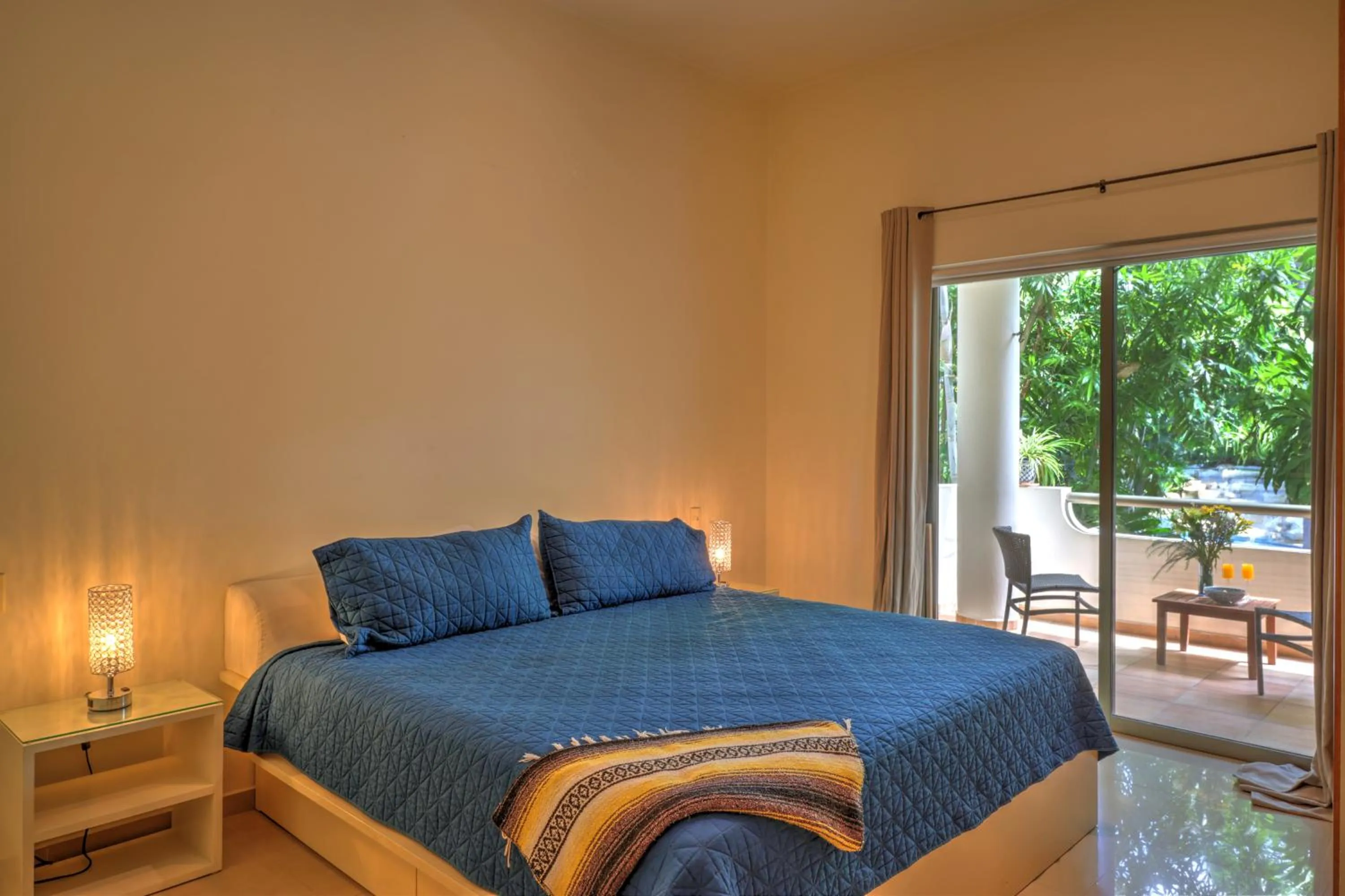 Bed in Riviera Maya Suites