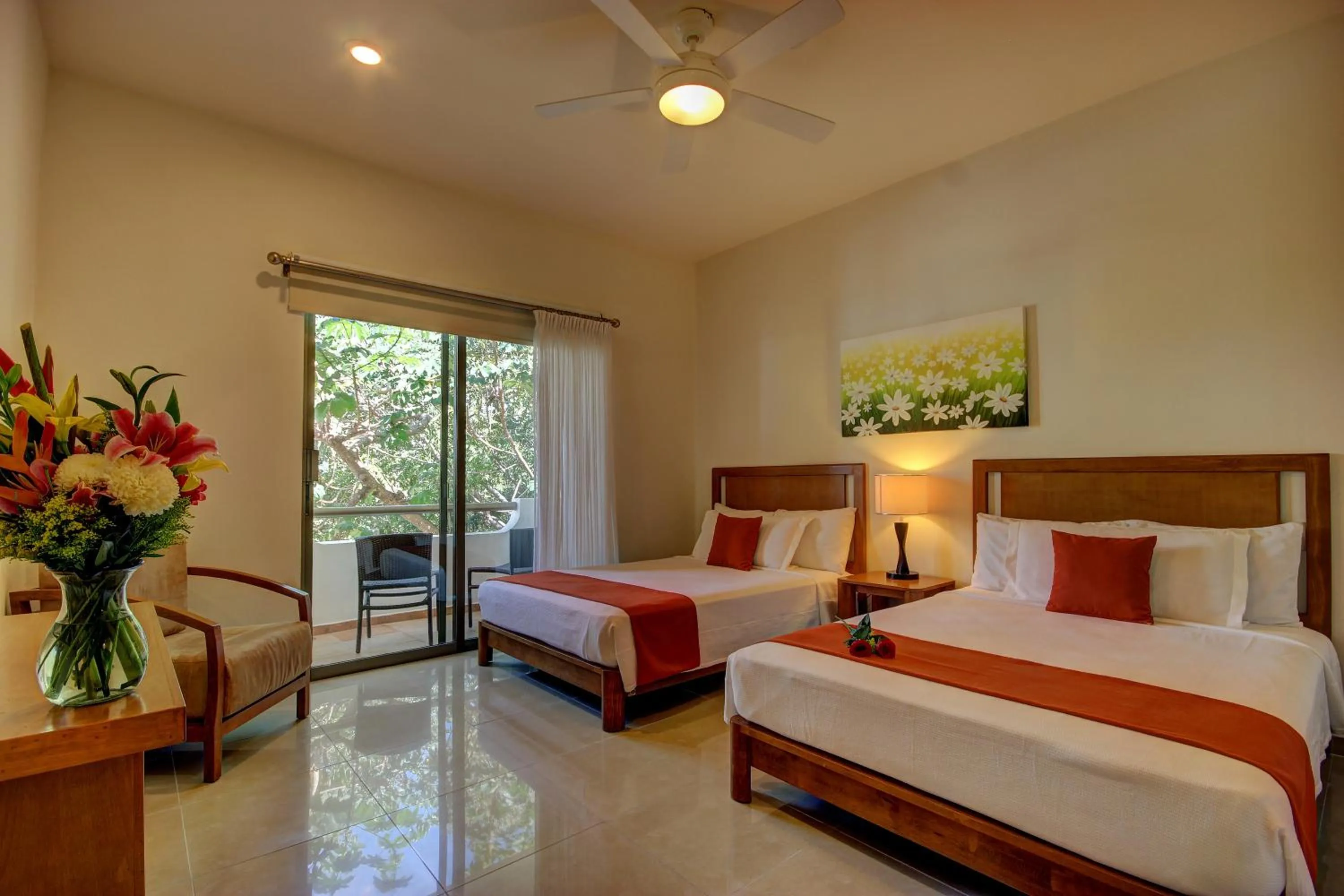 Bed in Riviera Maya Suites