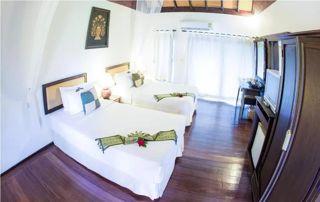 Bed in Golden Pine Resort and Spa Bed in Golden Pine Resort and Spa