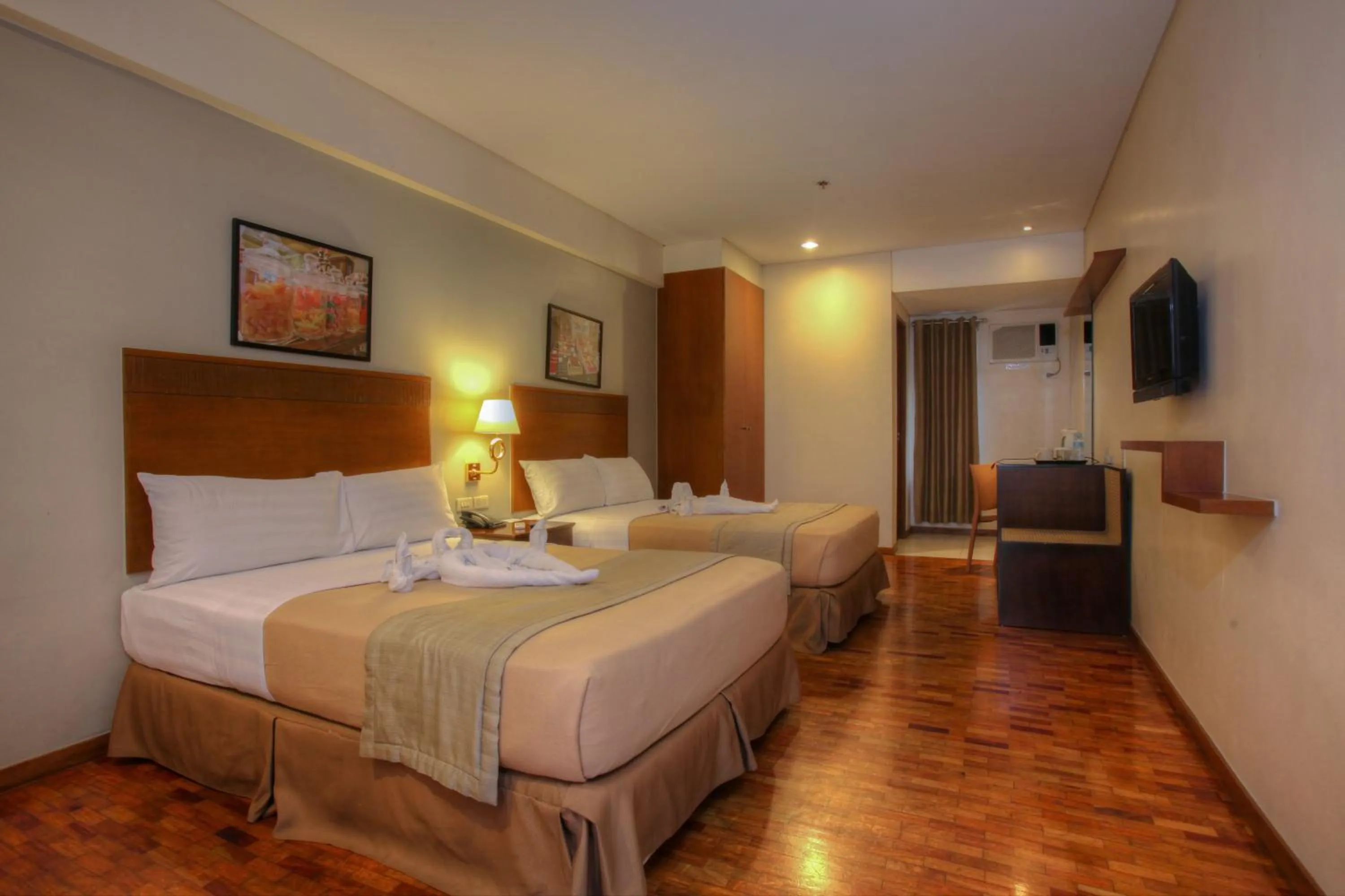 Photo of the whole room, Bed in Fersal Hotel Kalayaan, Quezon City