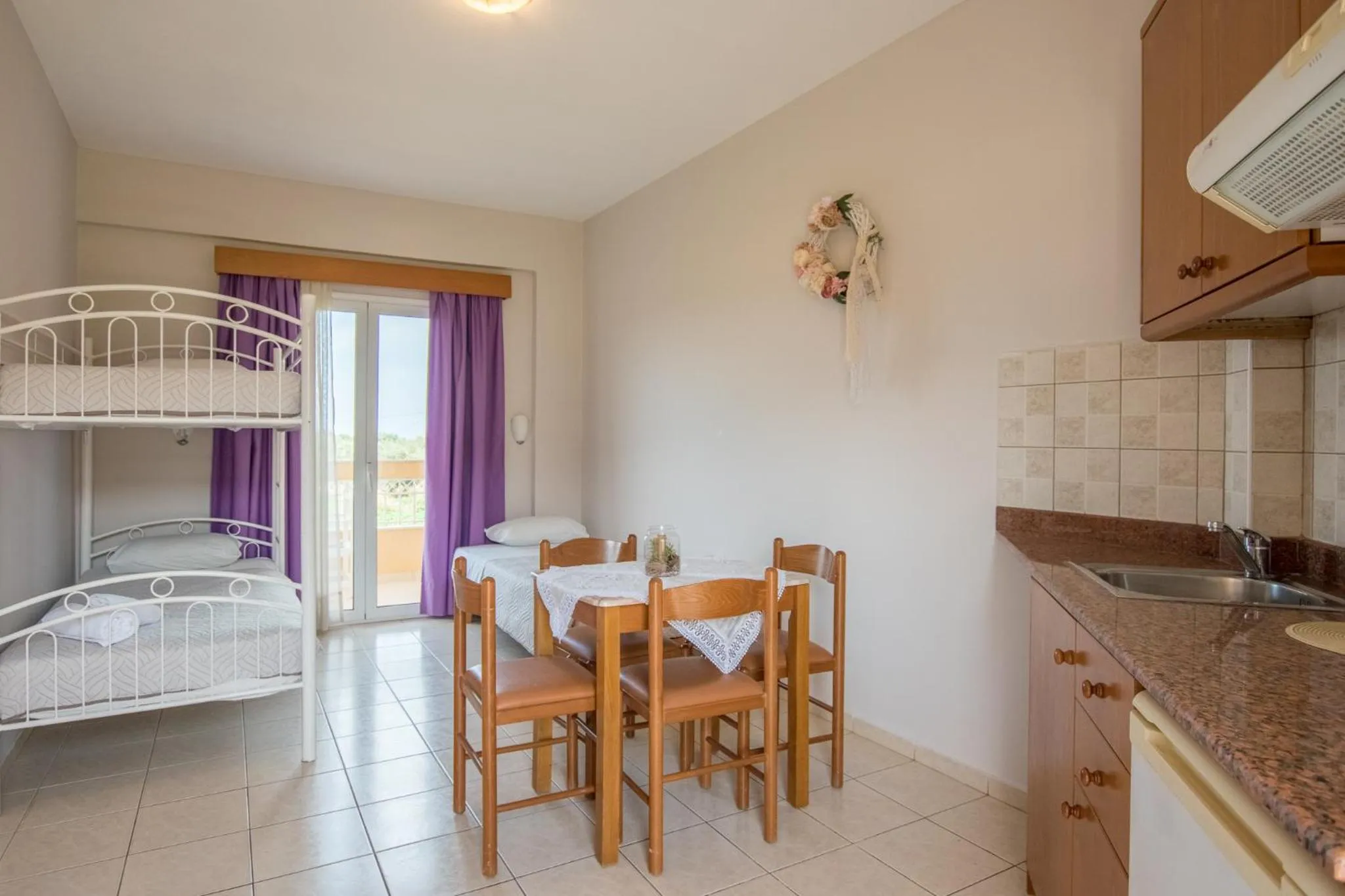 Kitchen or kitchenette, Bed in Danelis Studios & Apartments