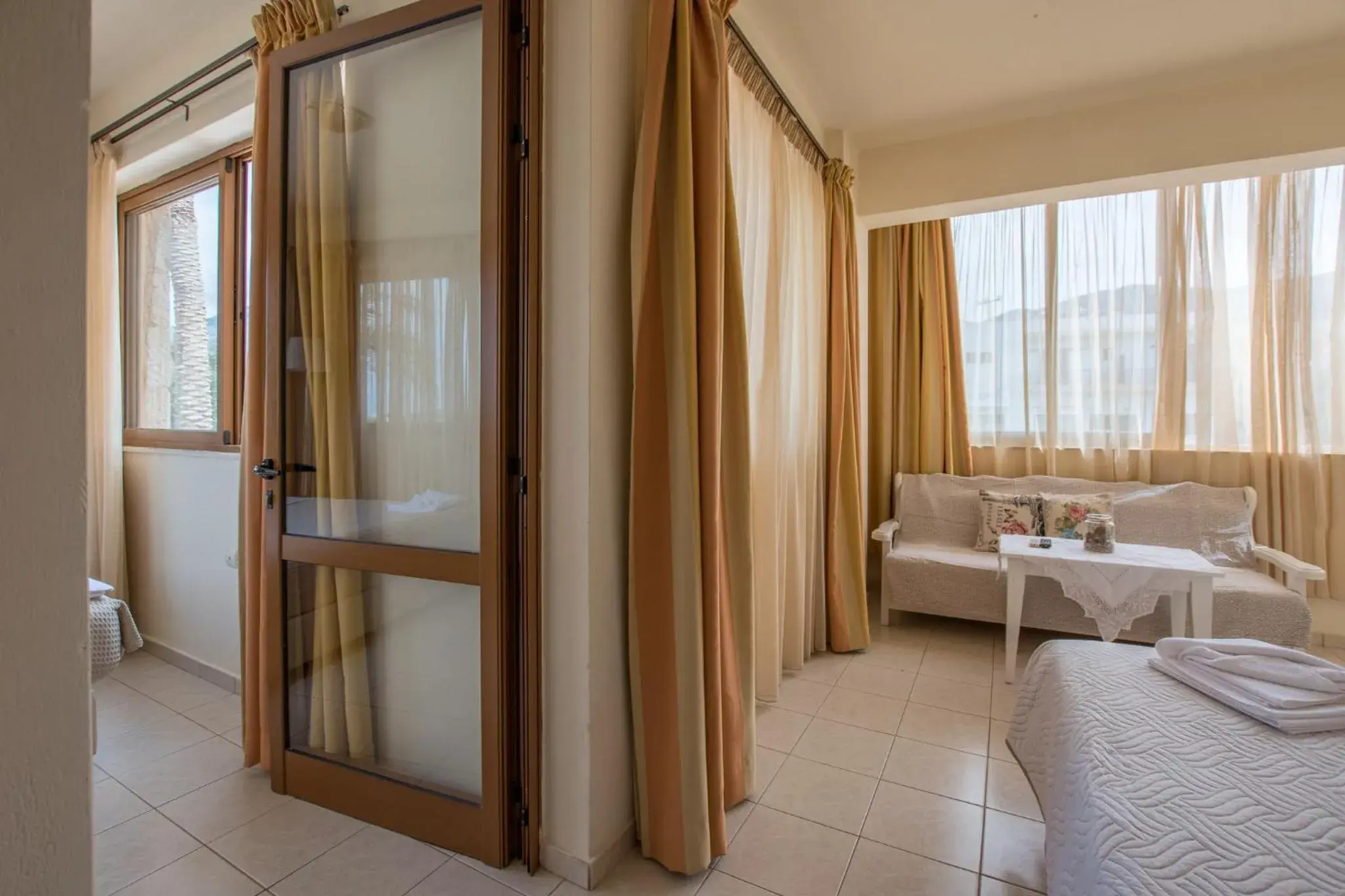 Seating area, Bed in Danelis Studios & Apartments Seating area, Bed in Danelis Studios & Apartments