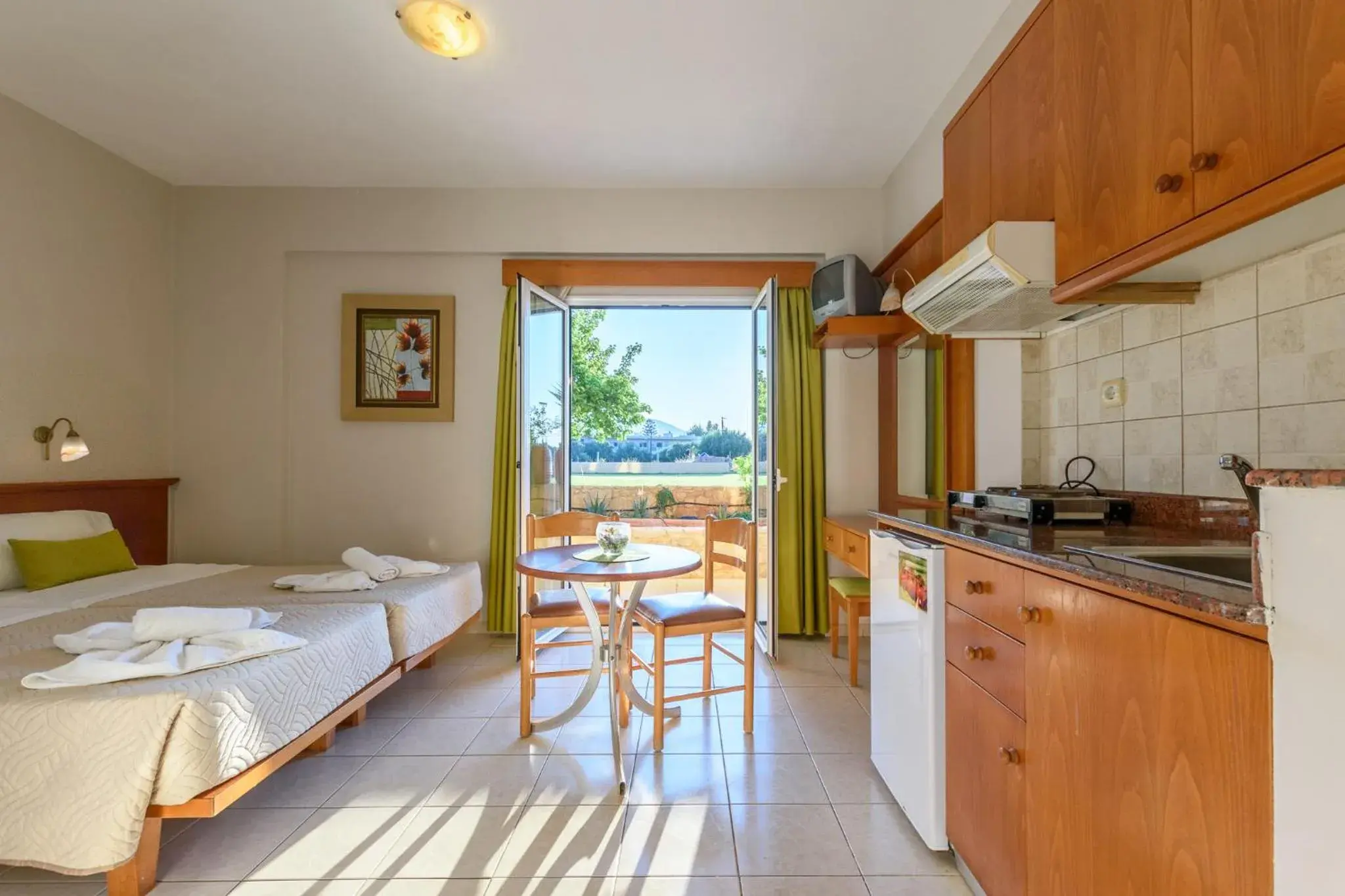 Kitchen or kitchenette, Bed in Danelis Studios & Apartments Kitchen or kitchenette, Bed in Danelis Studios & Apartments