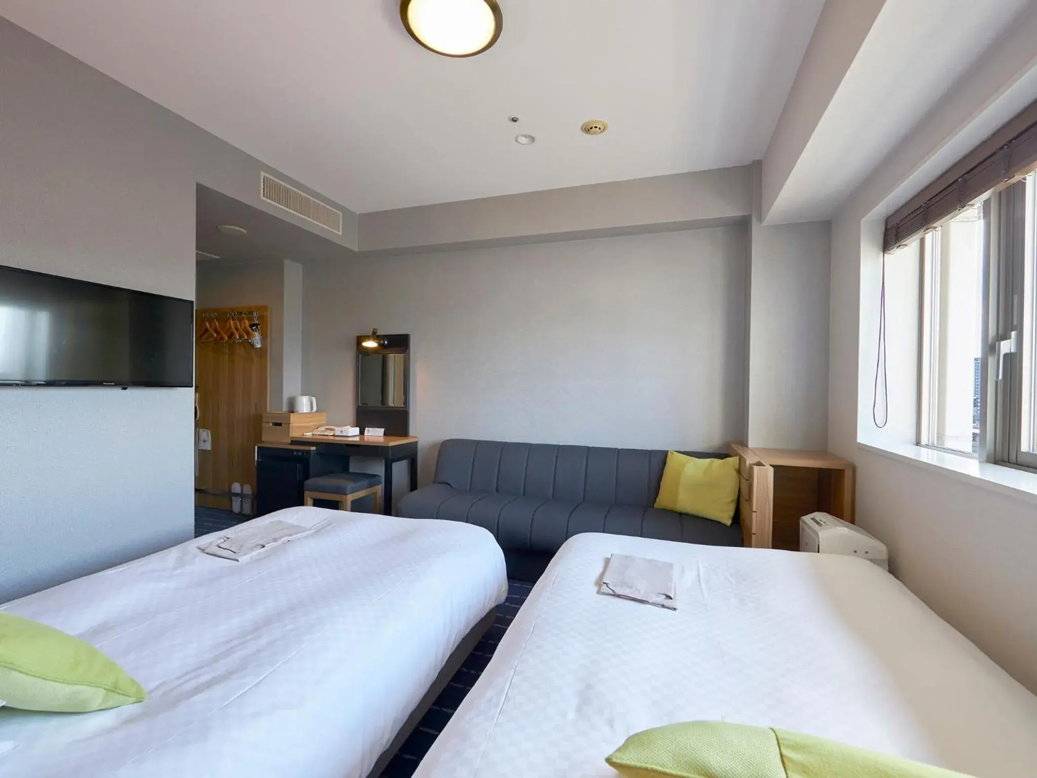 Bed in Hearton Hotel Nishi Umeda Bed in Hearton Hotel Nishi Umeda