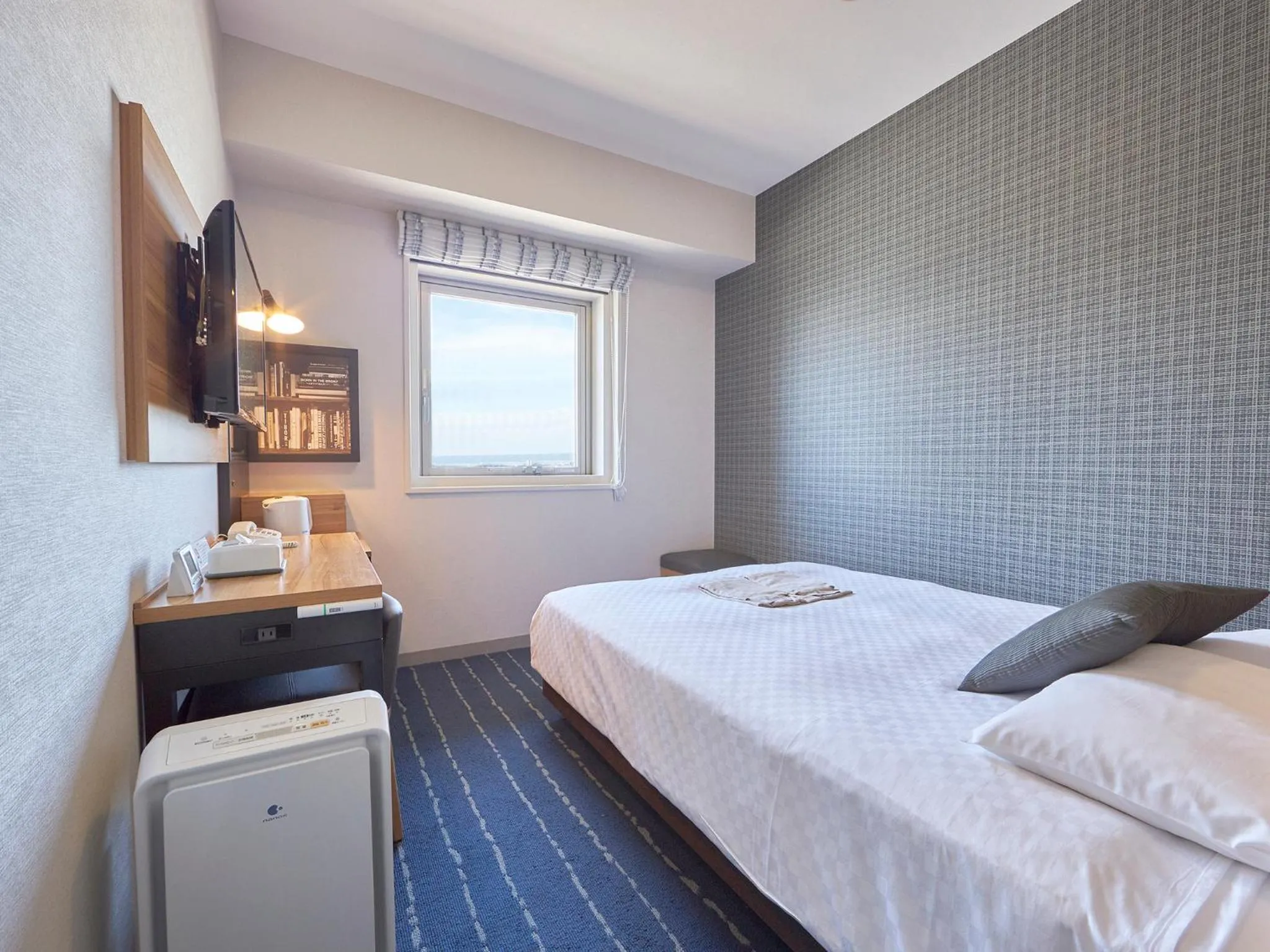 Photo of the whole room, Bed in Hearton Hotel Nishi Umeda