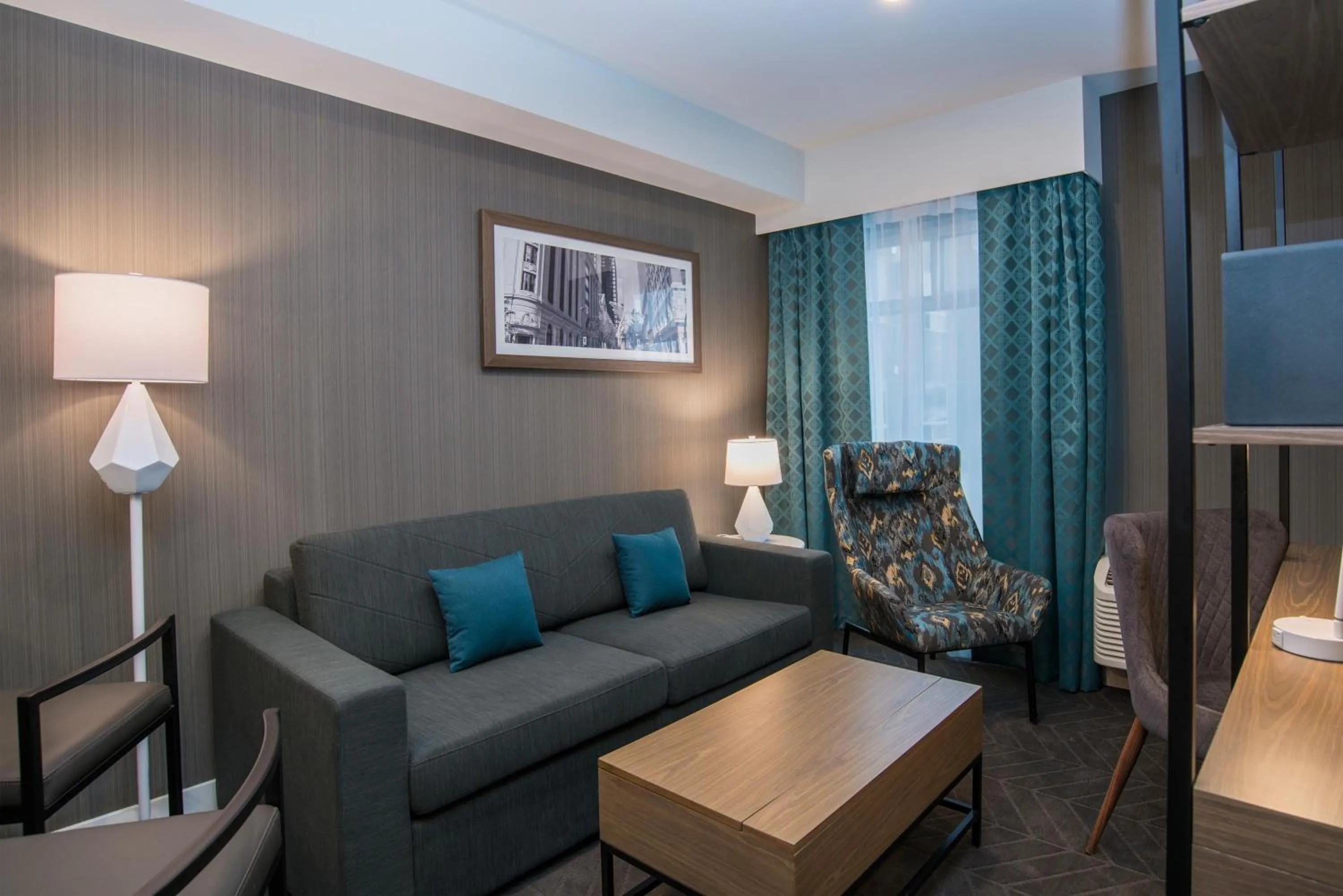 Photo of the whole room in Sandman Signature Calgary Airport Hotel