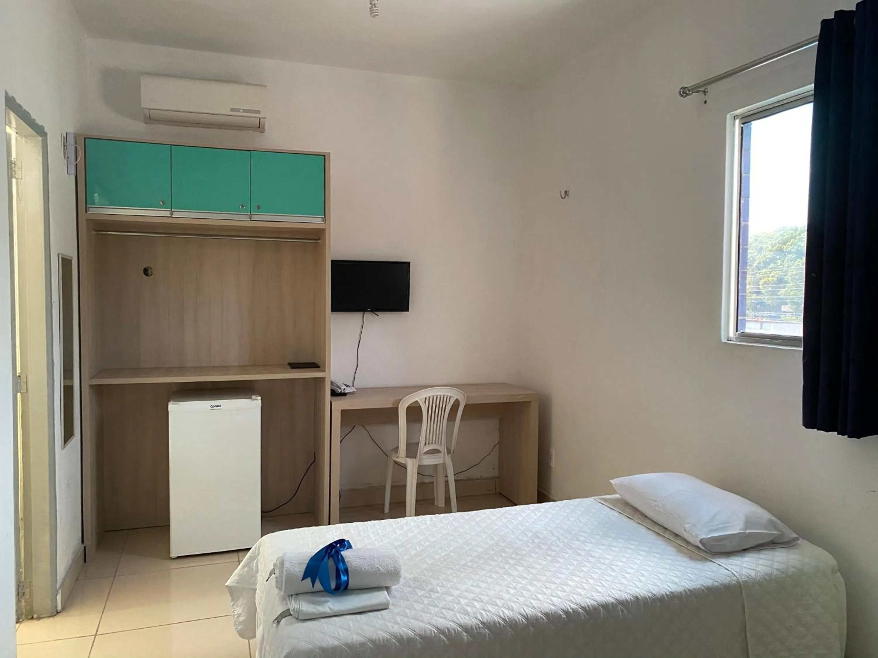 Bed in Hotel Pousada Universitária