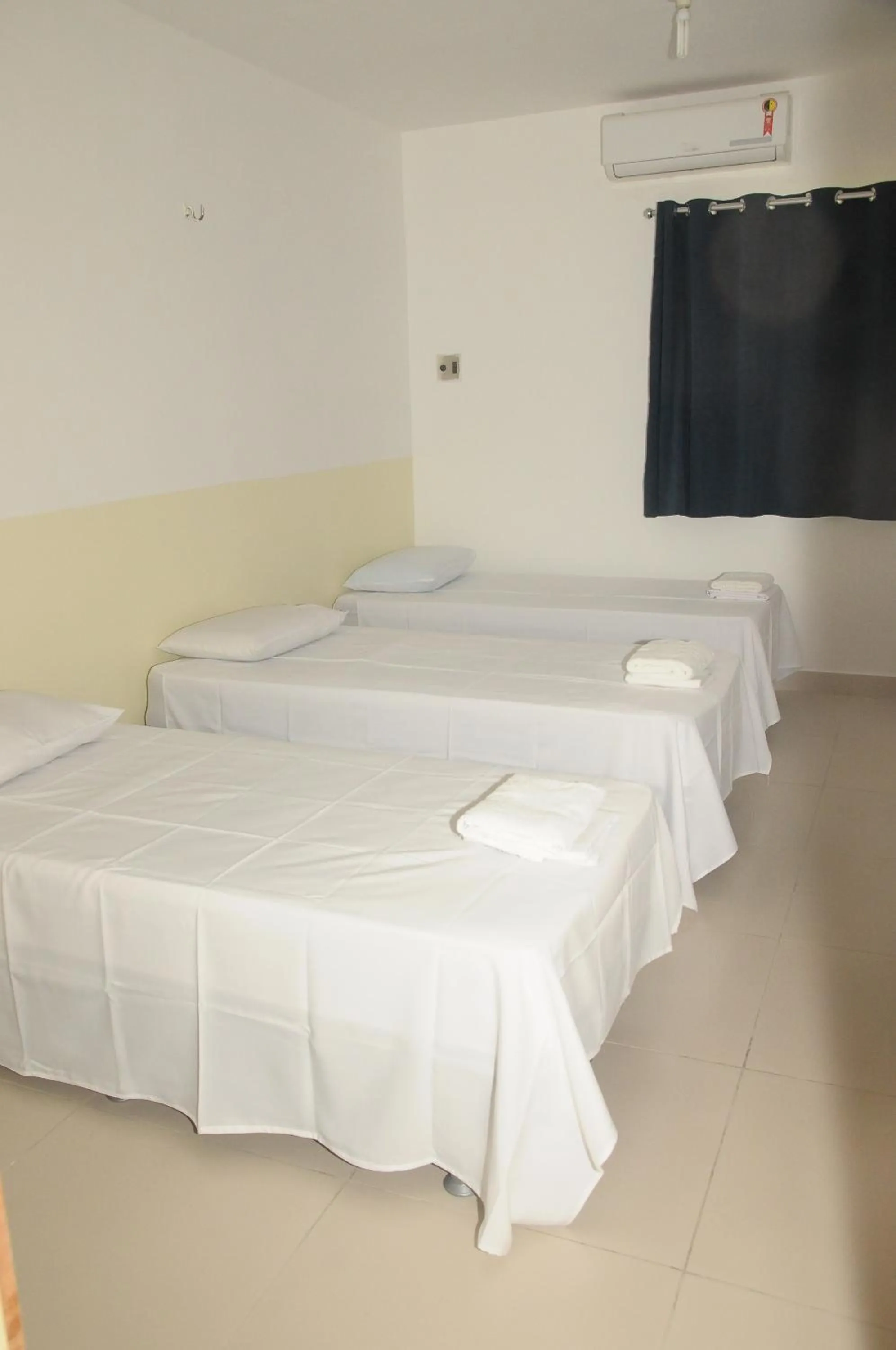 Bed in Hotel Pousada Universitária