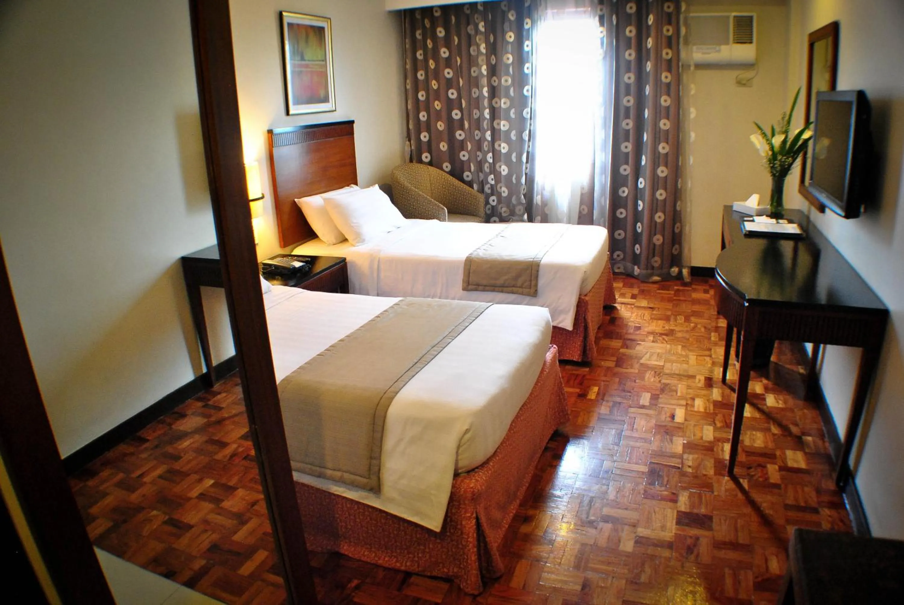 Bed in Fersal Hotel Neptune Makati