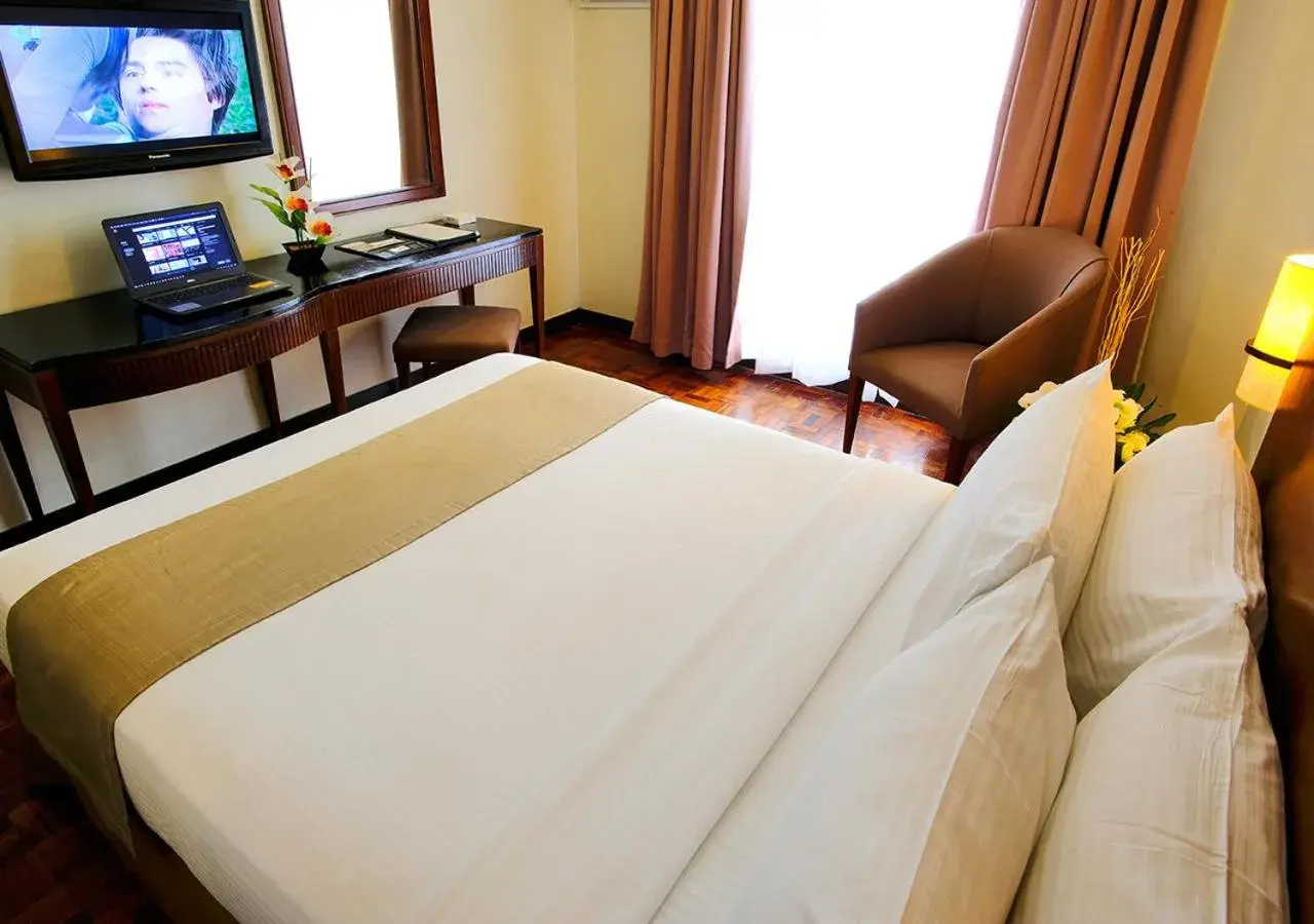 Bed in Fersal Hotel Neptune Makati Bed in Fersal Hotel Neptune Makati