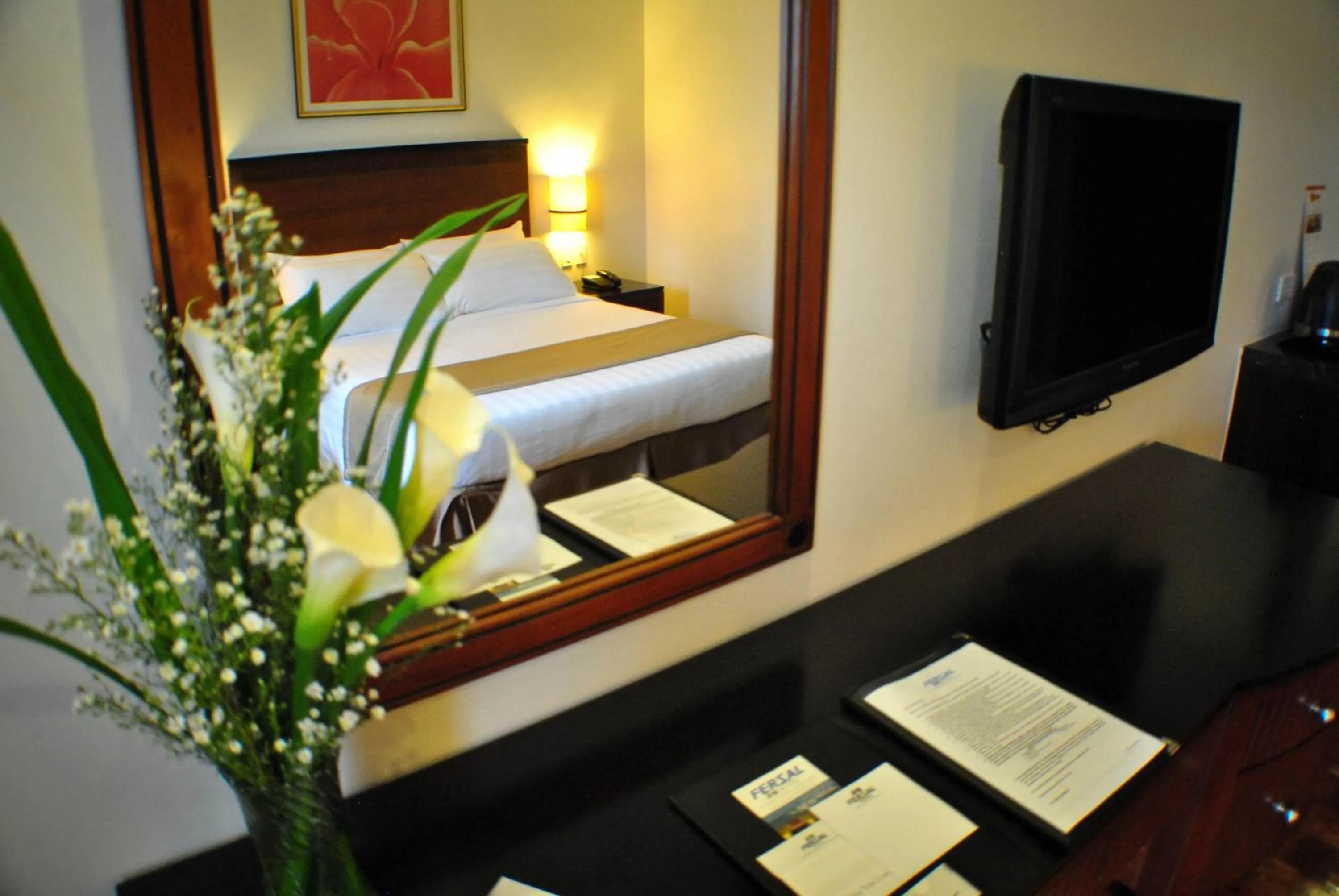 Bed in Fersal Hotel Neptune Makati