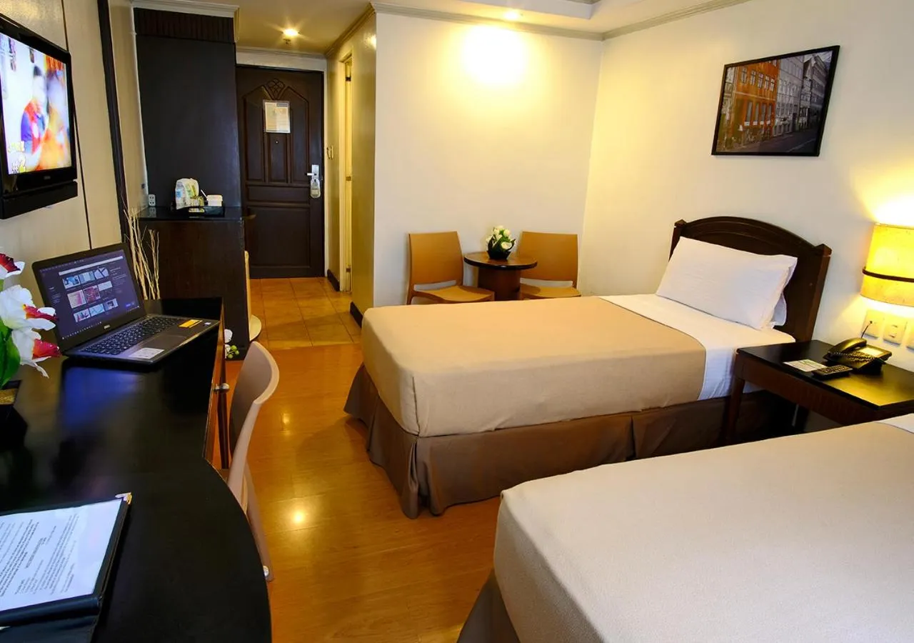 Bed in Fersal Hotel Neptune Makati