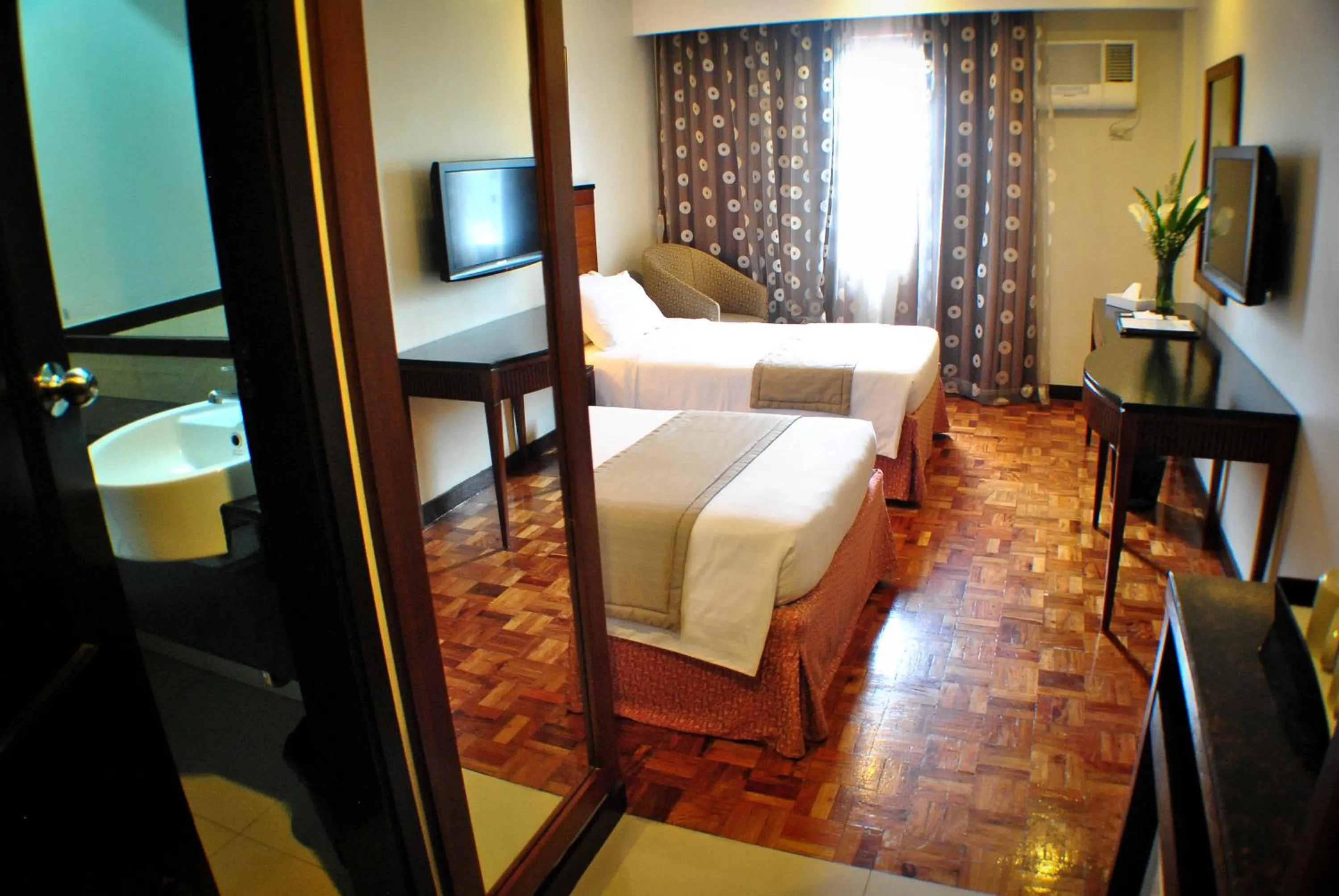 Photo of the whole room, Bed in Fersal Hotel Neptune Makati