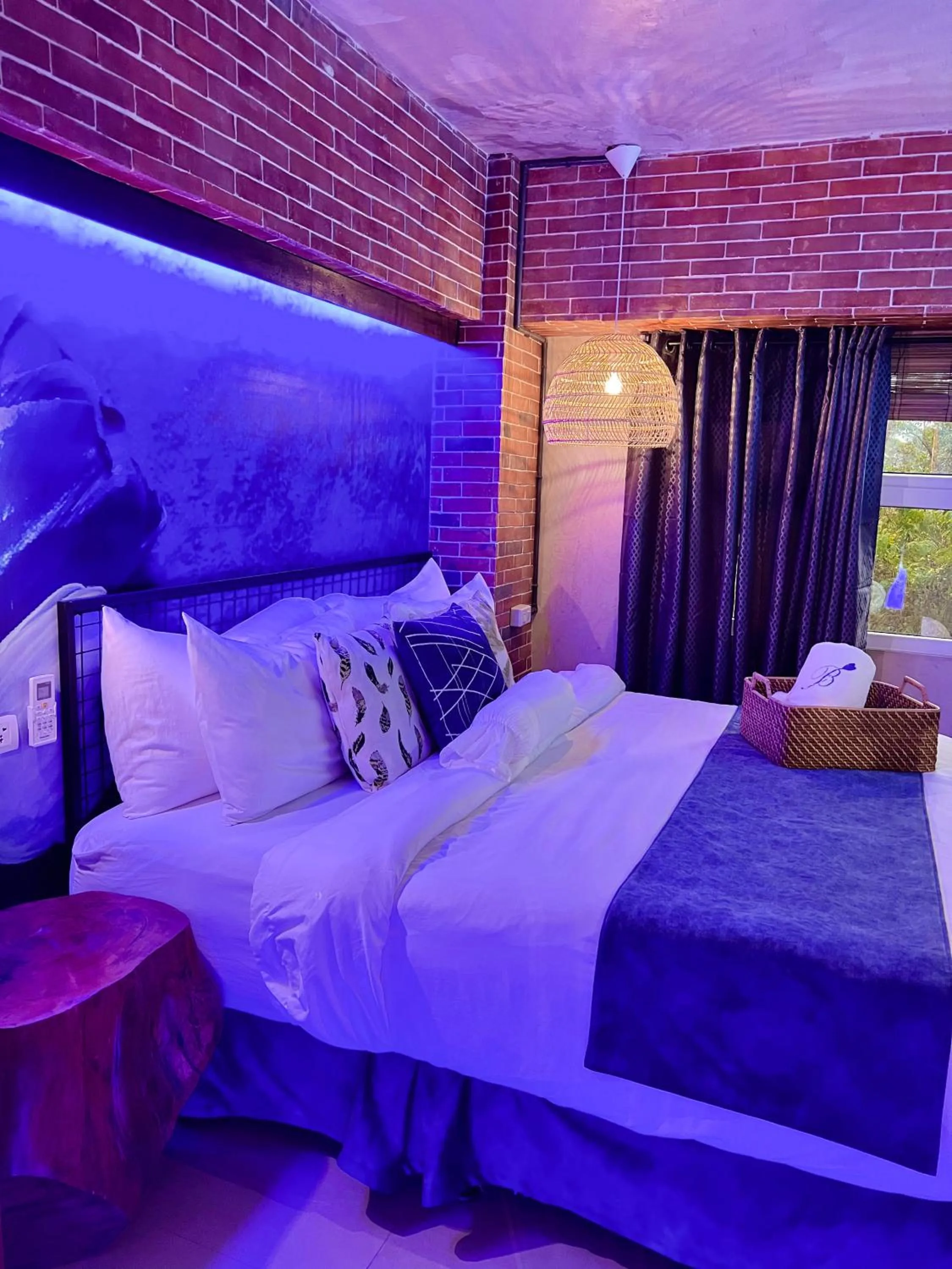 Bed in CLOCKWORKORANGE Luxury Suites