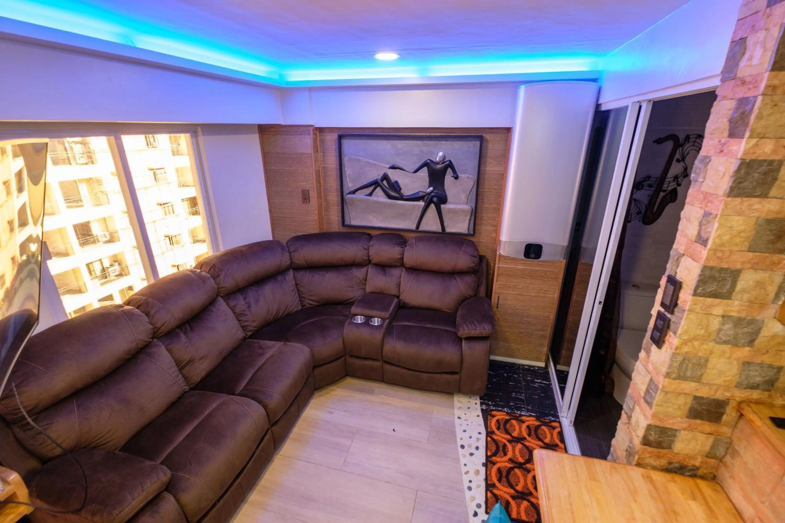 Seating area in CLOCKWORKORANGE Luxury Suites