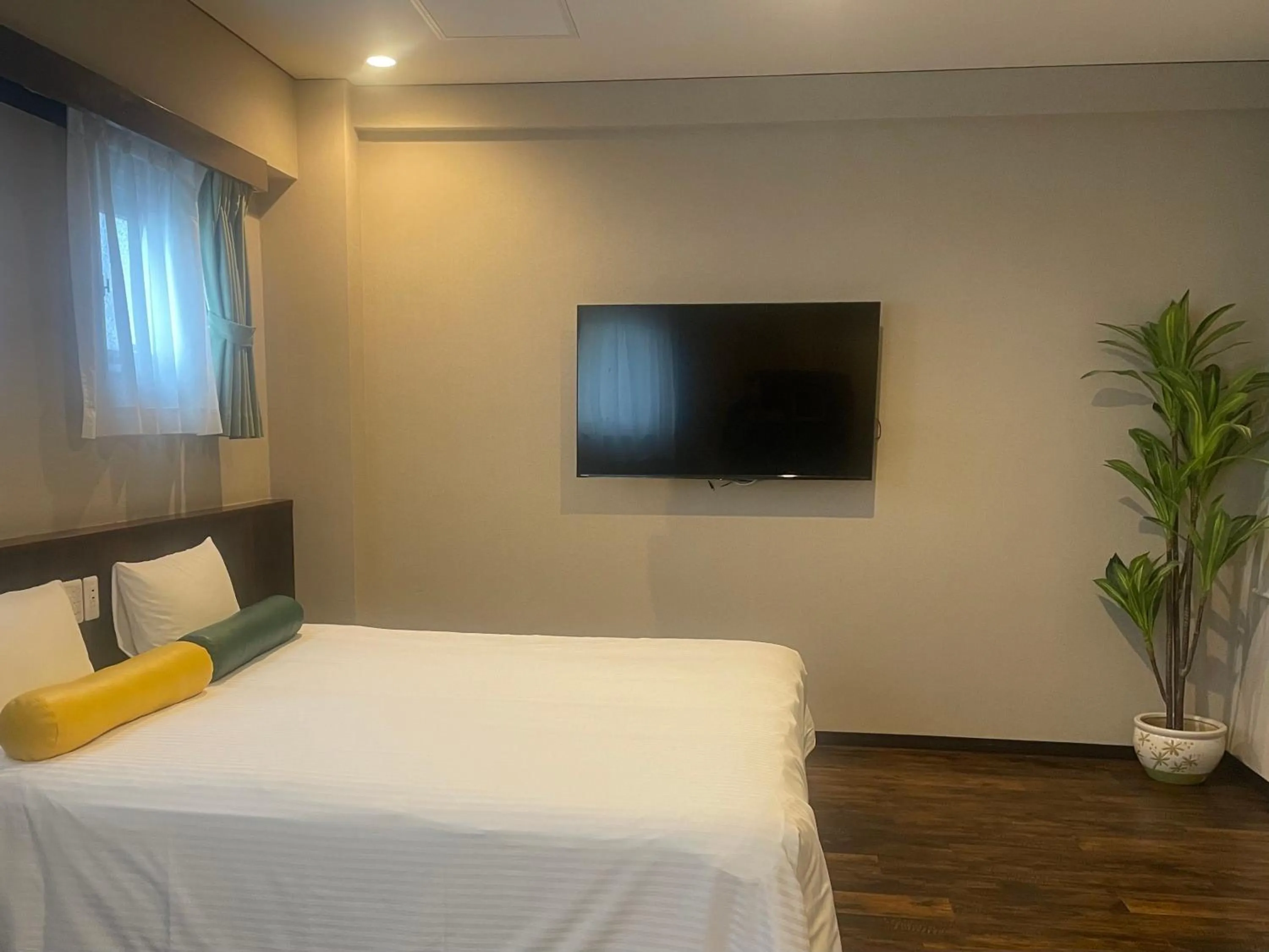 Bed in Rycom Crystal Hotel