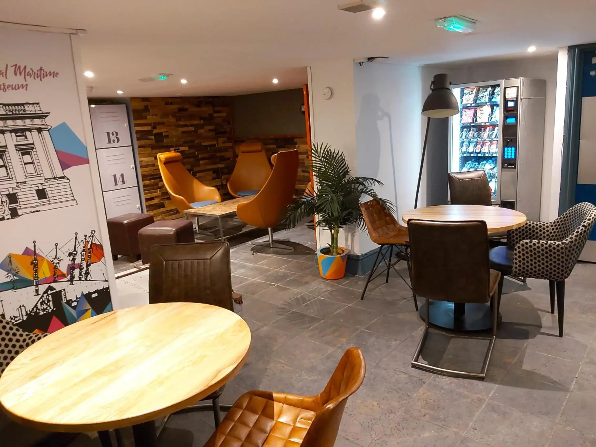 Communal lounge/ TV room in St Christopher's Inn Greenwich Communal lounge/ TV room in St Christopher's Inn Greenwich