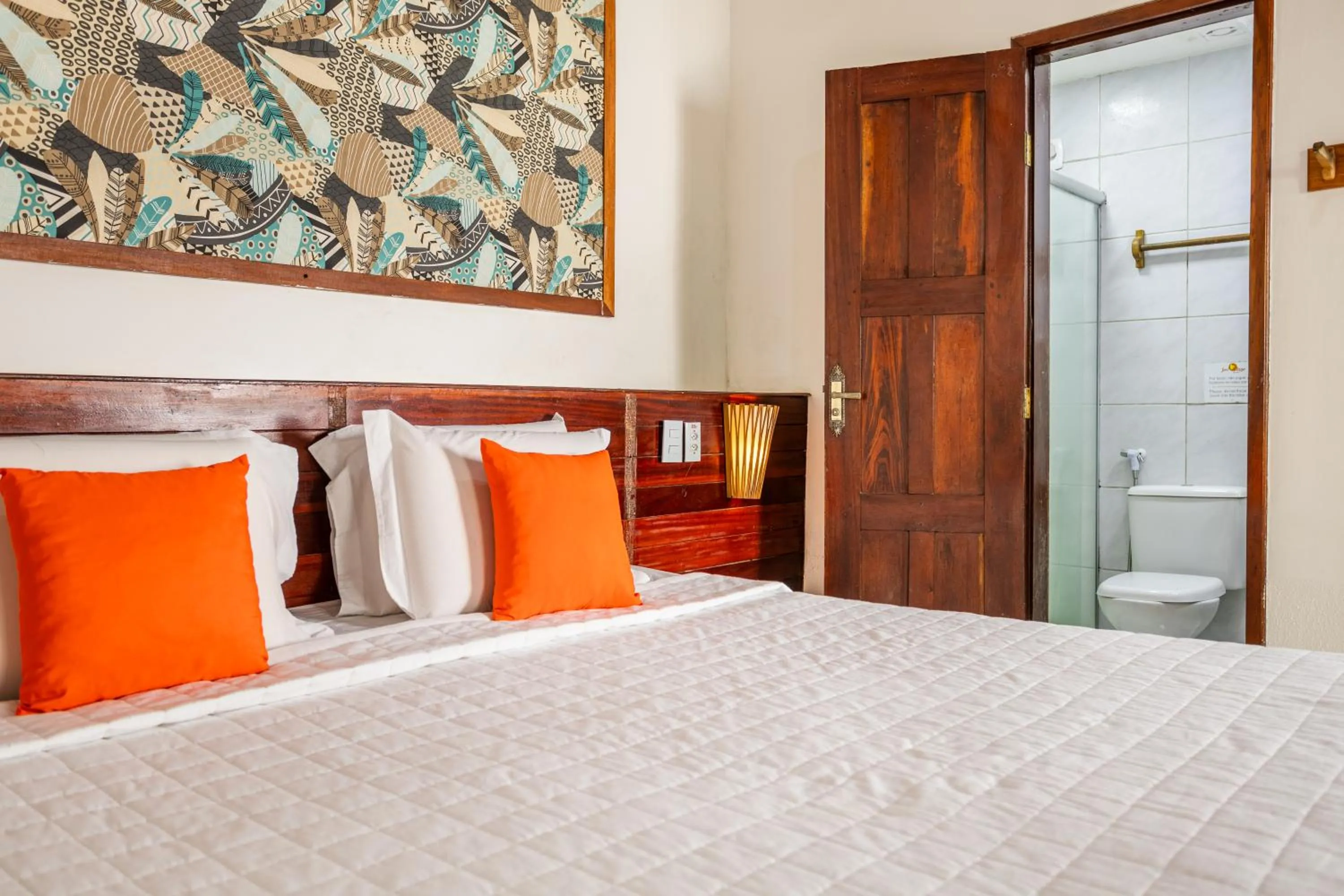 Bed in Jeri Village Hotel