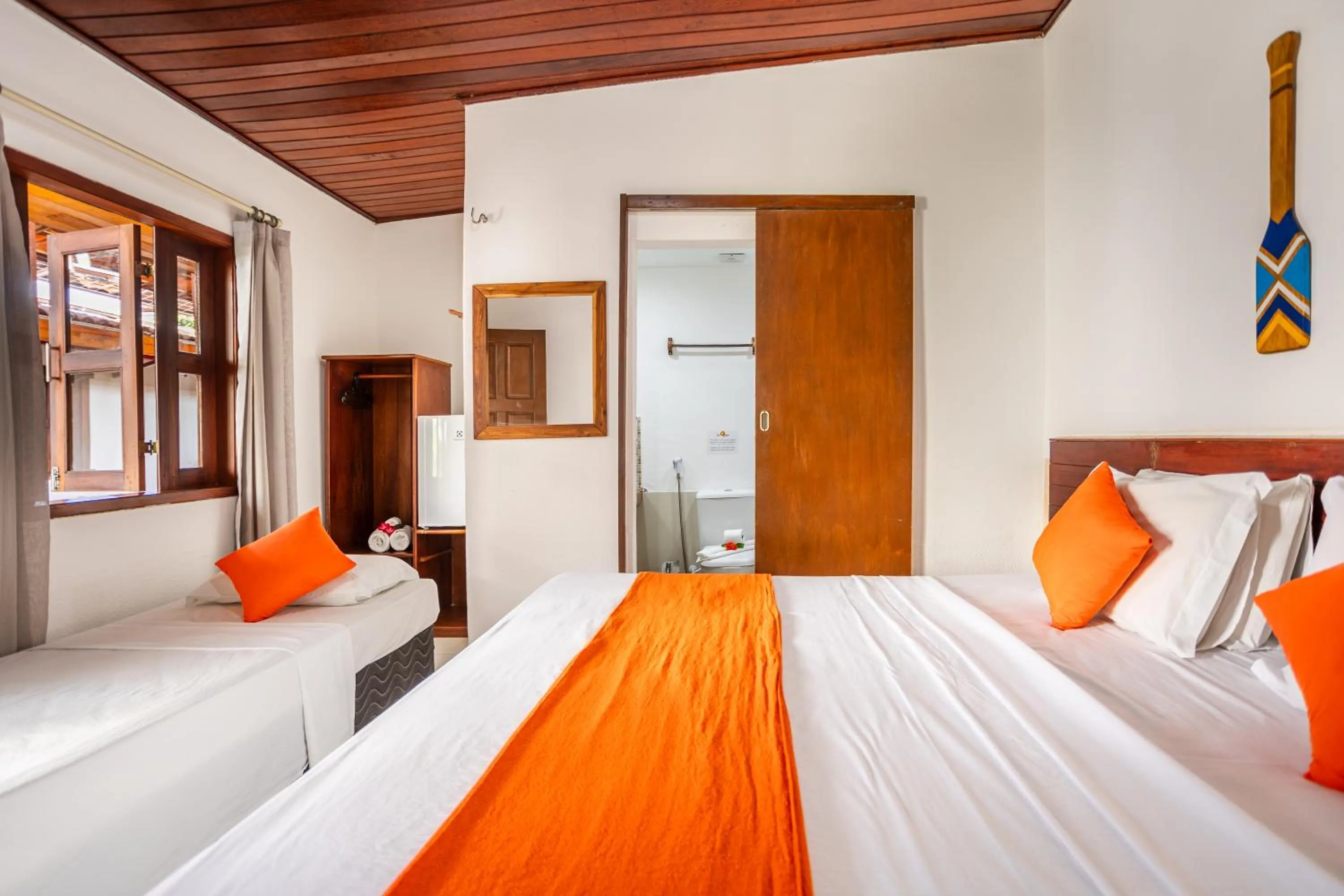 Bed in Jeri Village Hotel