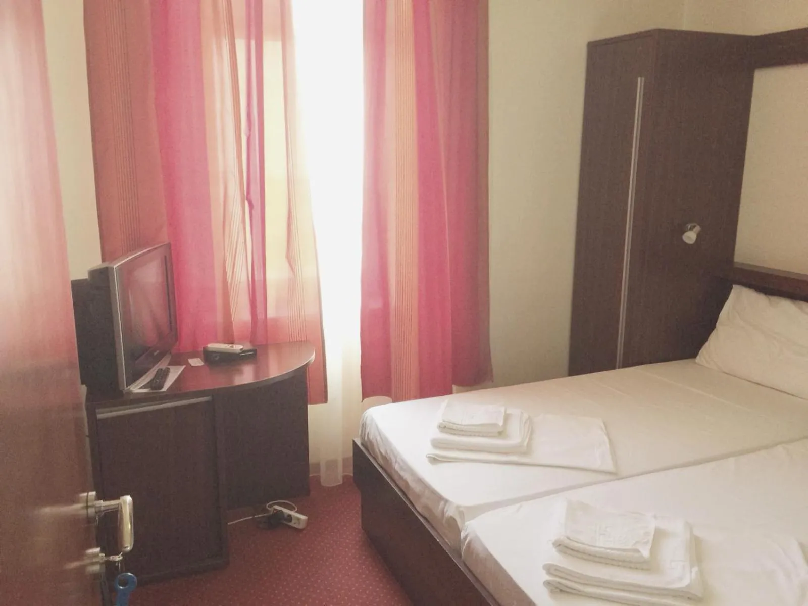 Bed in Lux Hotel Pansion