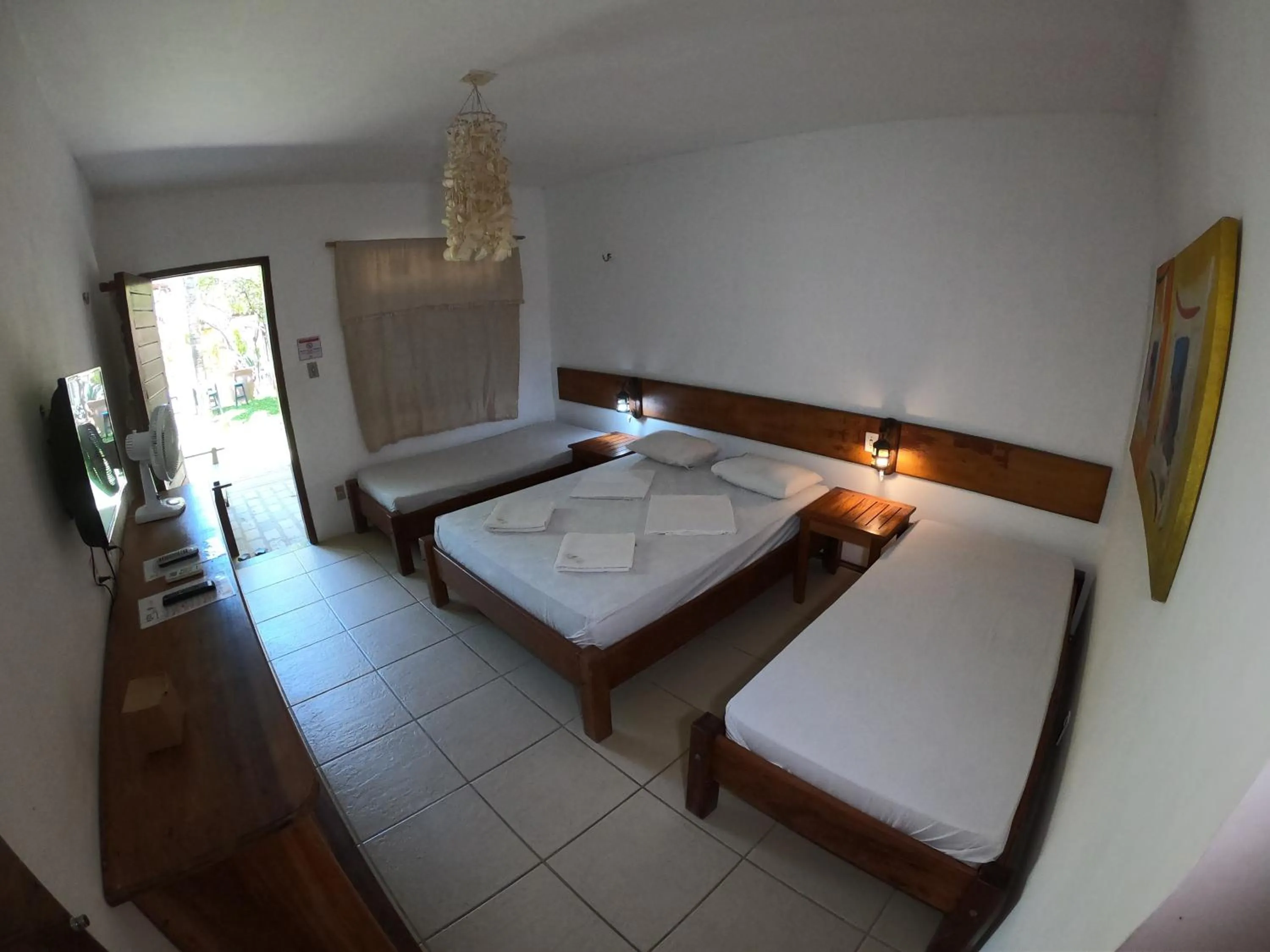 Bed in Pousada Casa Do Angelo