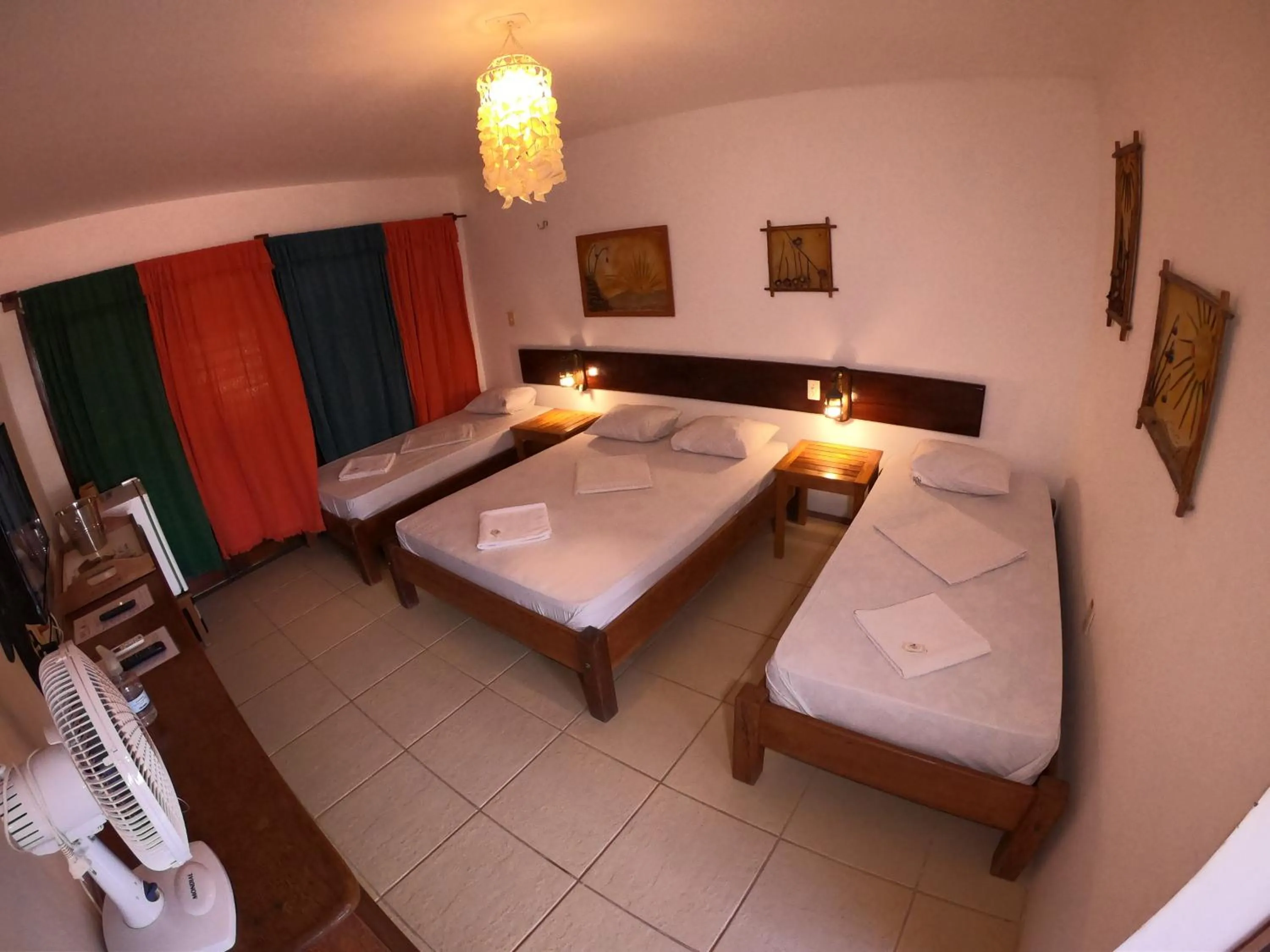 Bed in Pousada Casa Do Angelo