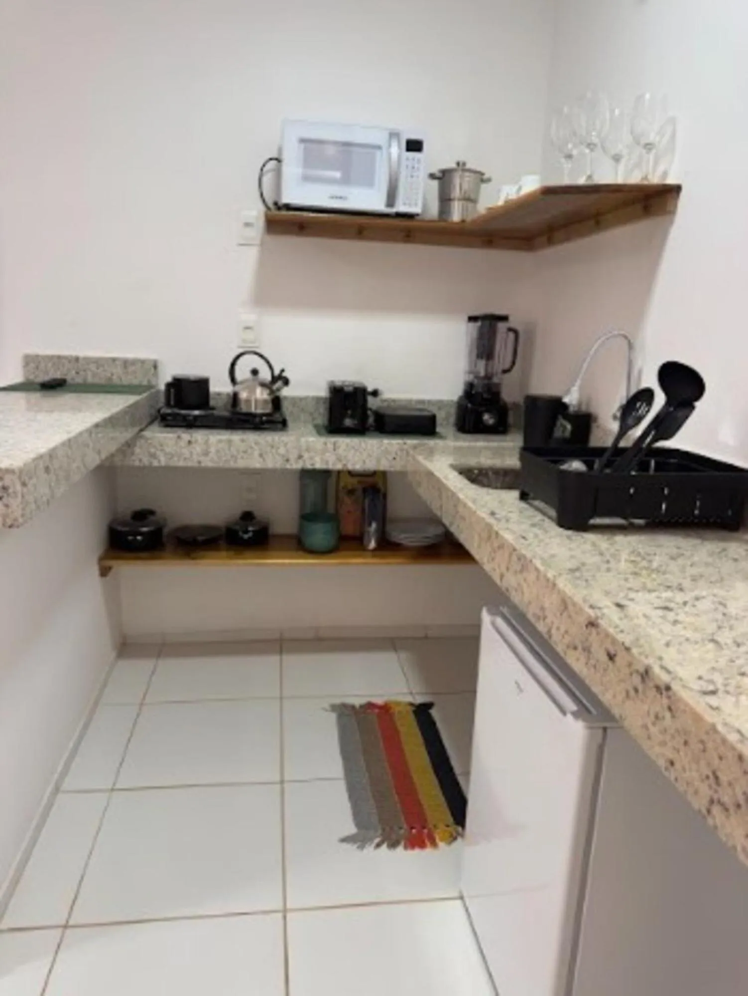 Kitchen or kitchenette in Pousada Capitão Thomaz