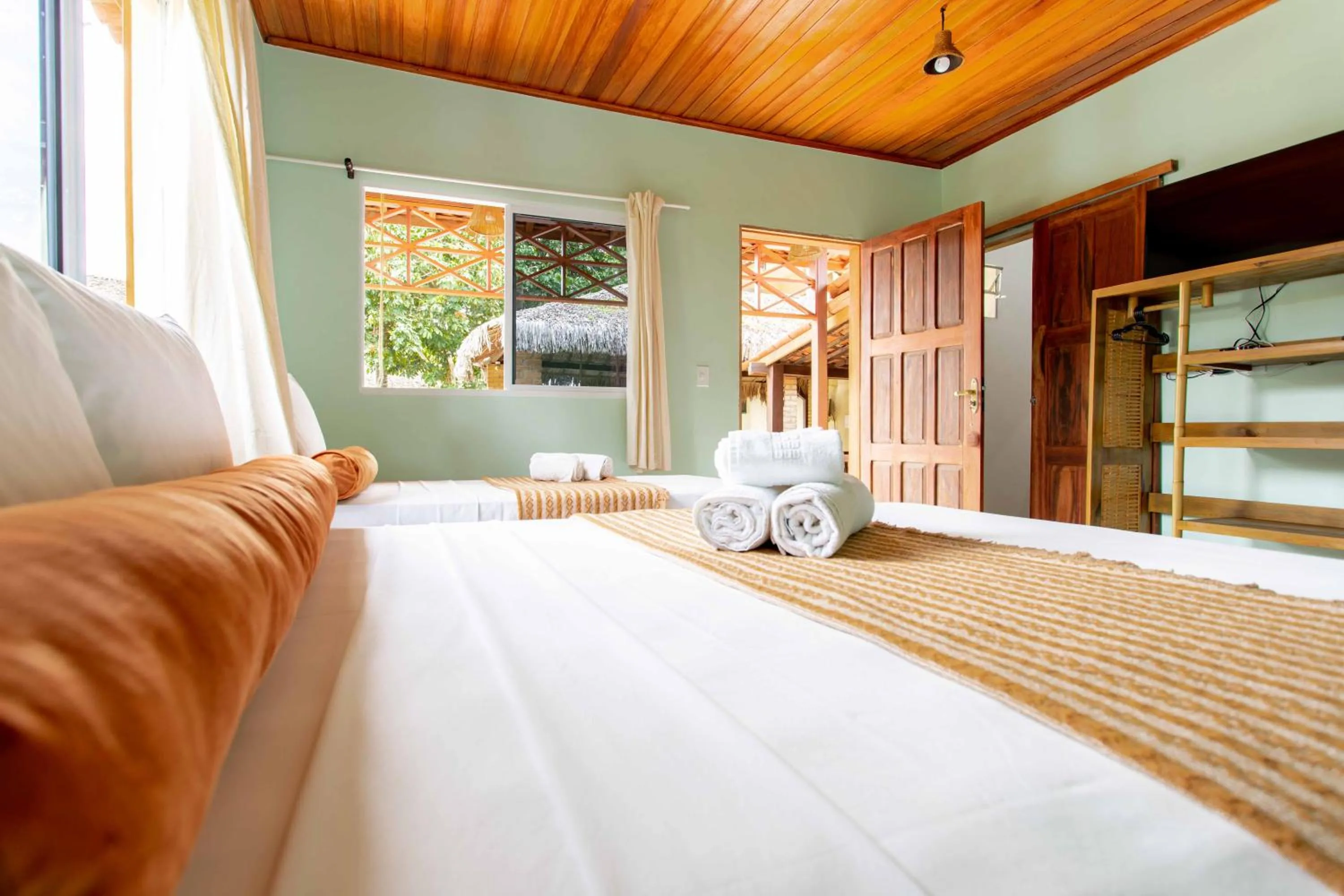 Bed in Pousada Capitão Thomaz