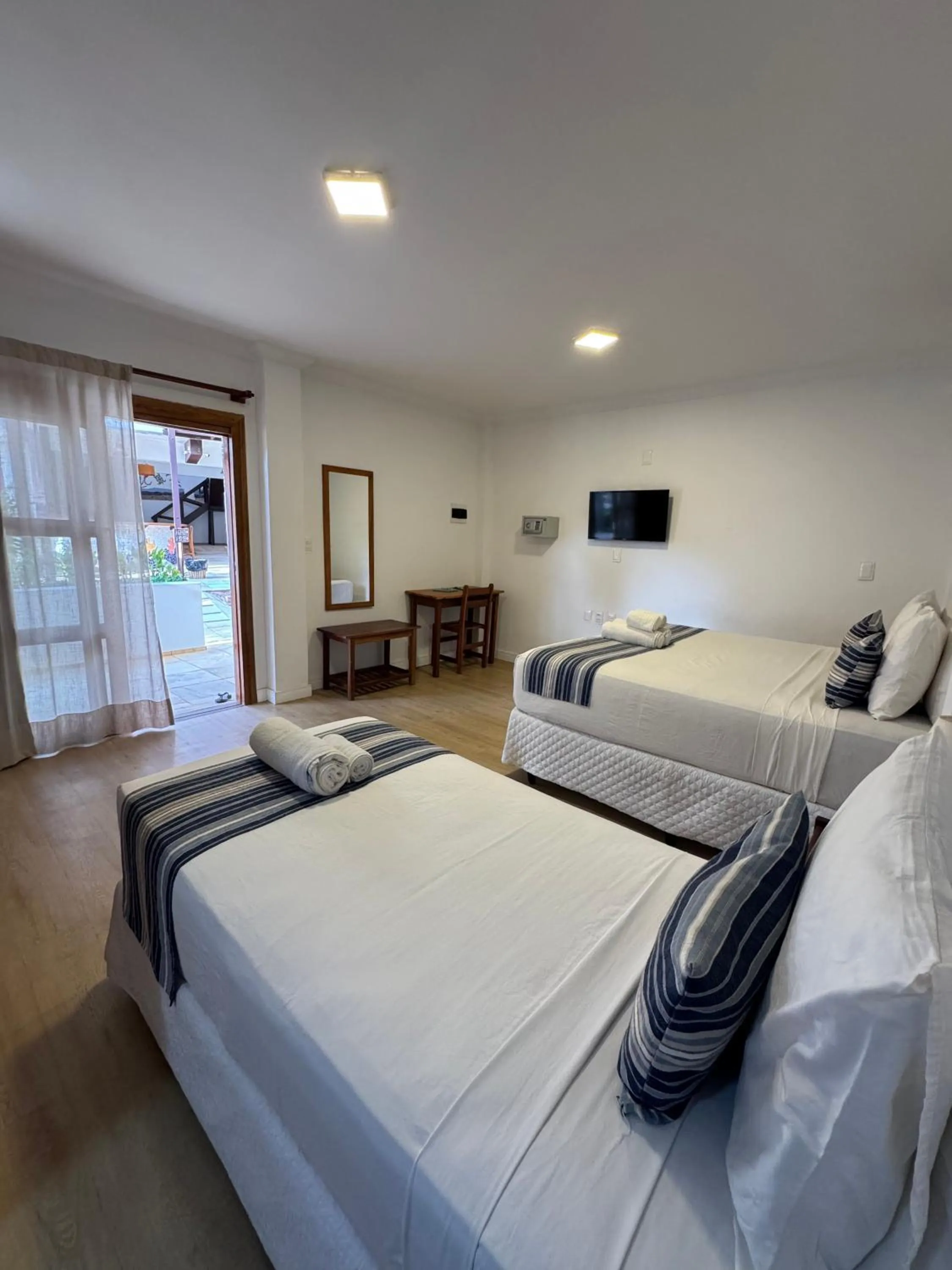 Bed in Pousada Capitão Thomaz