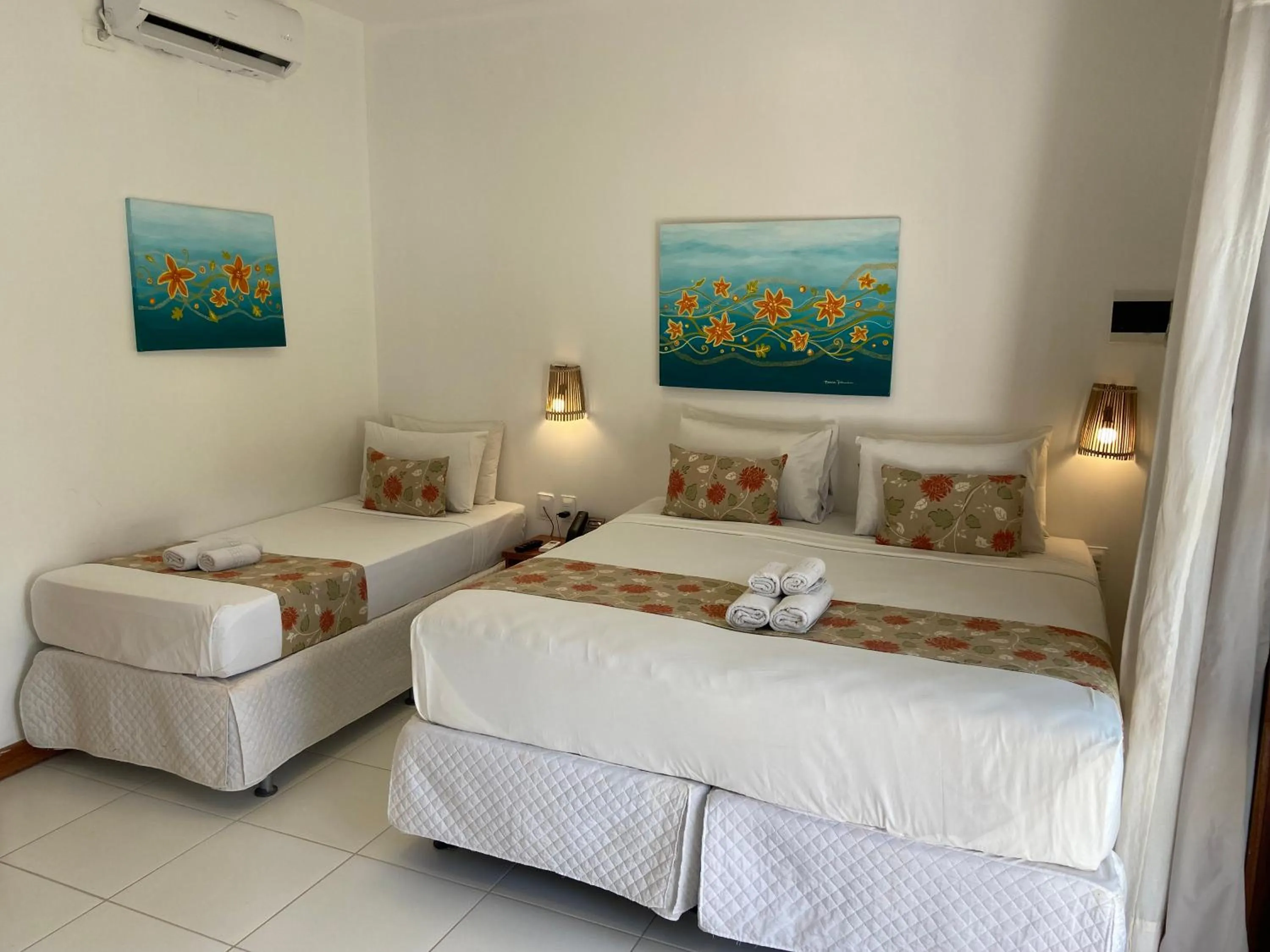 Bed in Pousada Capitão Thomaz