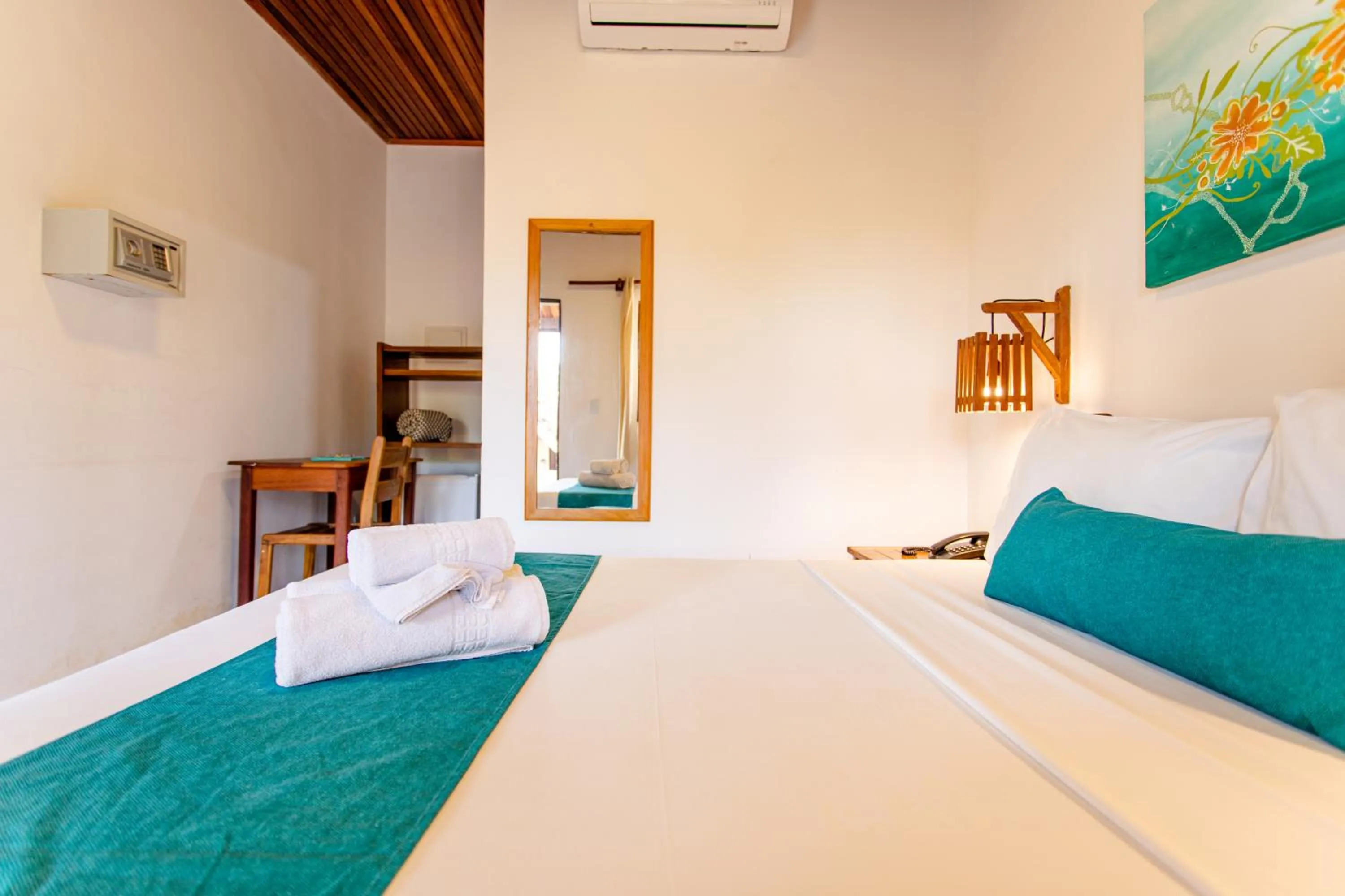 Bed in Pousada Capitão Thomaz