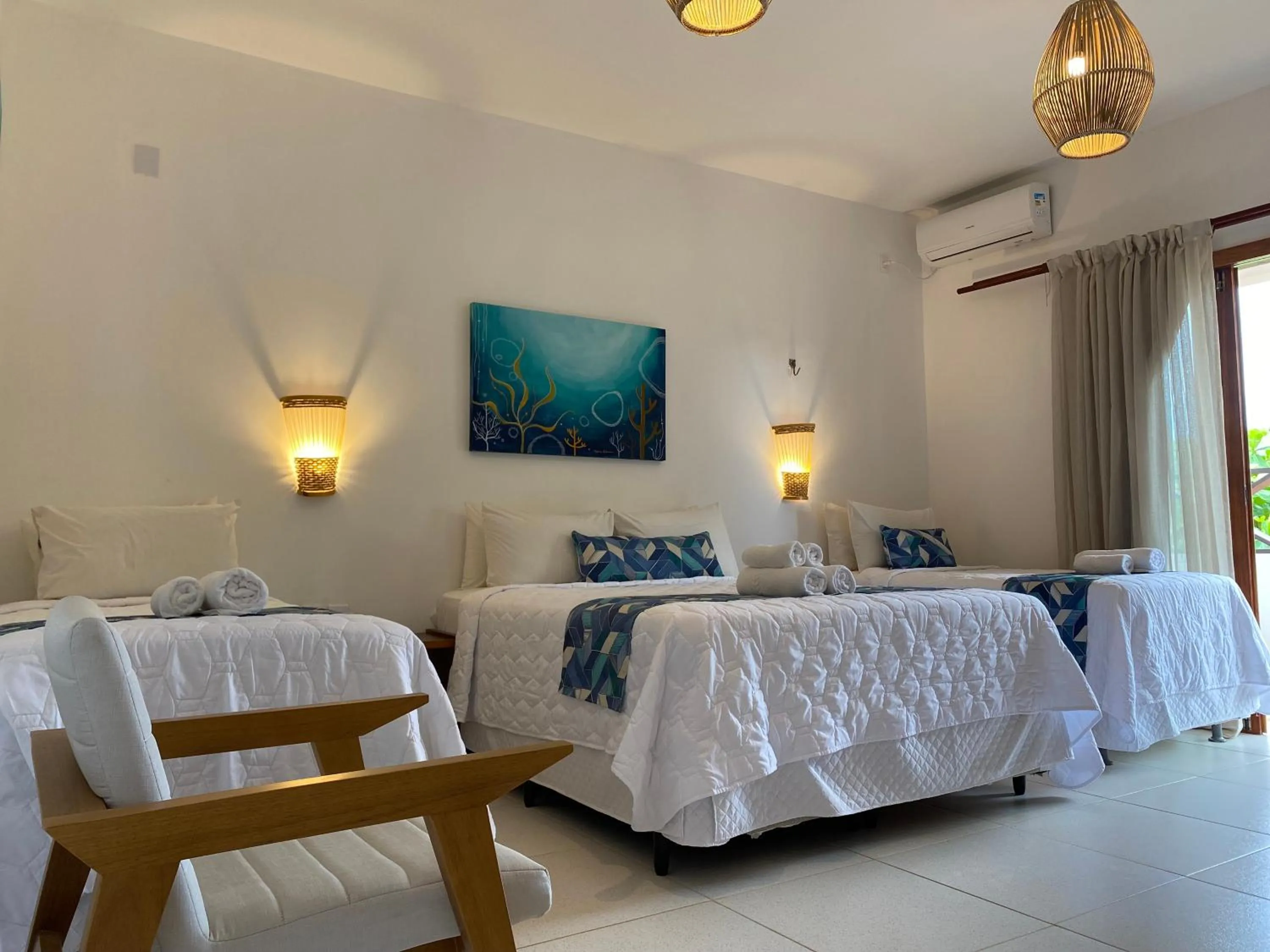 Bed in Pousada Capitão Thomaz