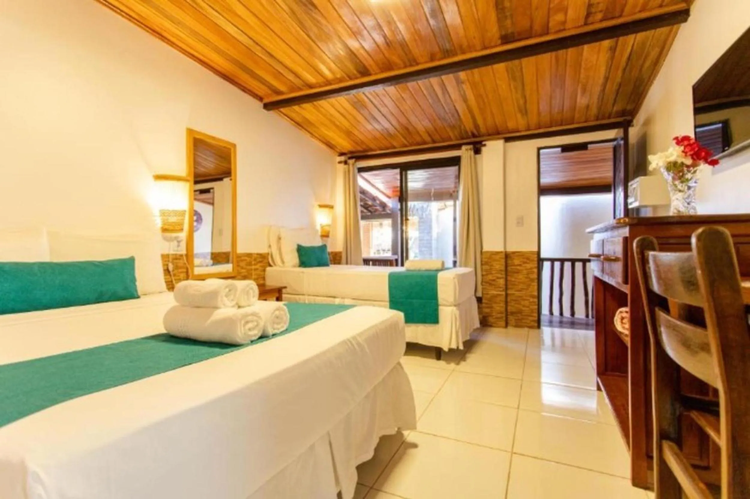 Bed in Pousada Capitão Thomaz