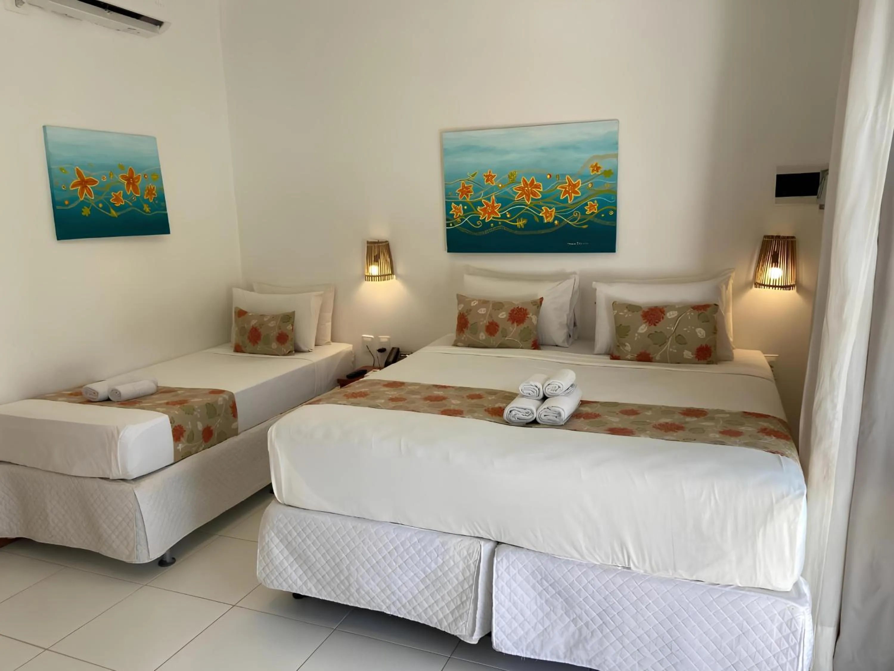 Bed in Pousada Capitão Thomaz